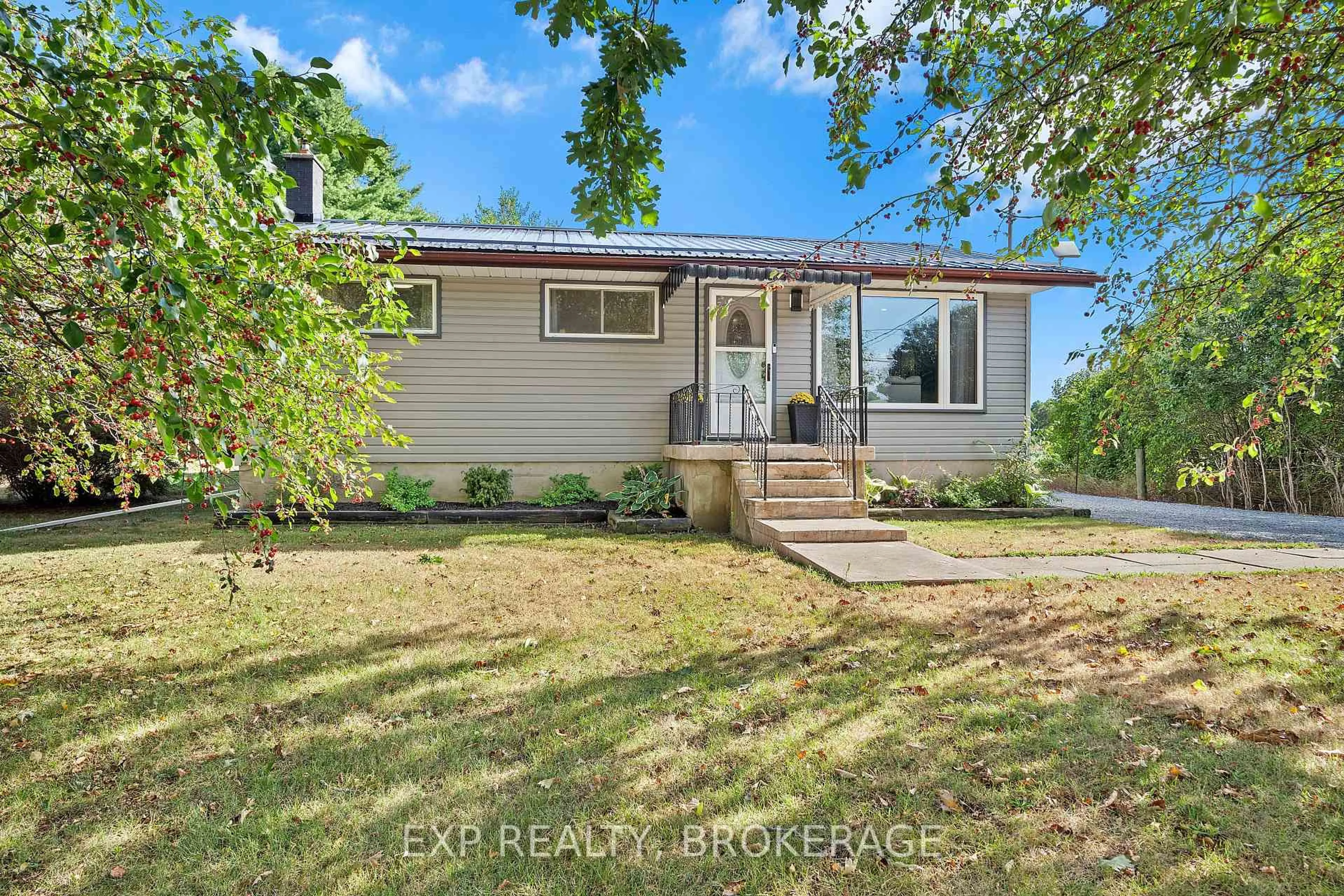 Home with vinyl exterior material, street for 3858 QUINN Rd, Harrowsmith Ontario K0H 1V0