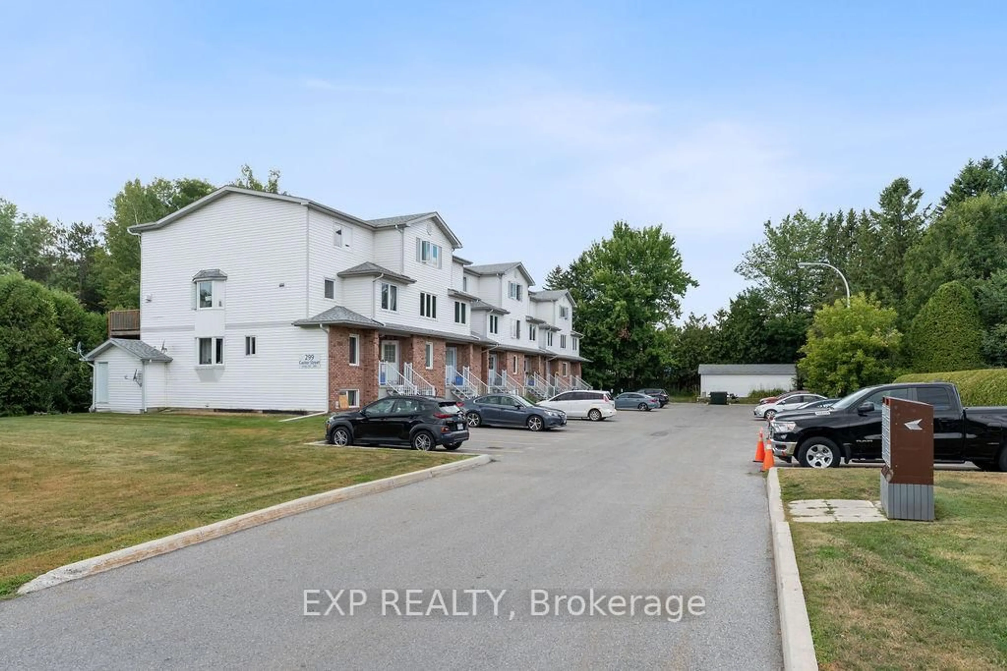 A pic from outside/outdoor area/front of a property/back of a property/a pic from drone, street for 299 Castor St #202, Russell Ontario K4R 1E9