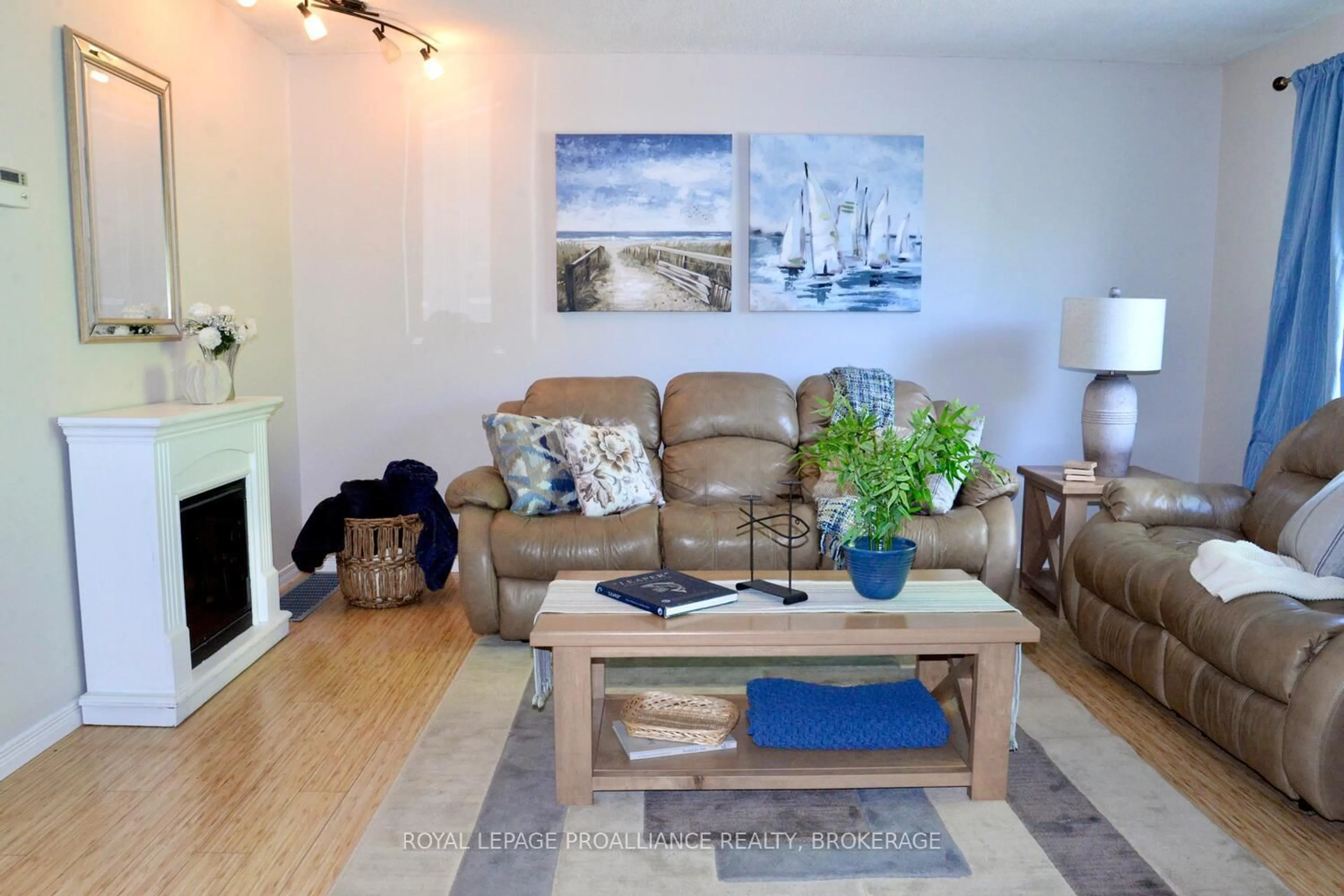 Living room with furniture, wood/laminate floor for 2 Guthrie Dr, Kingston Ontario K7K 5X5