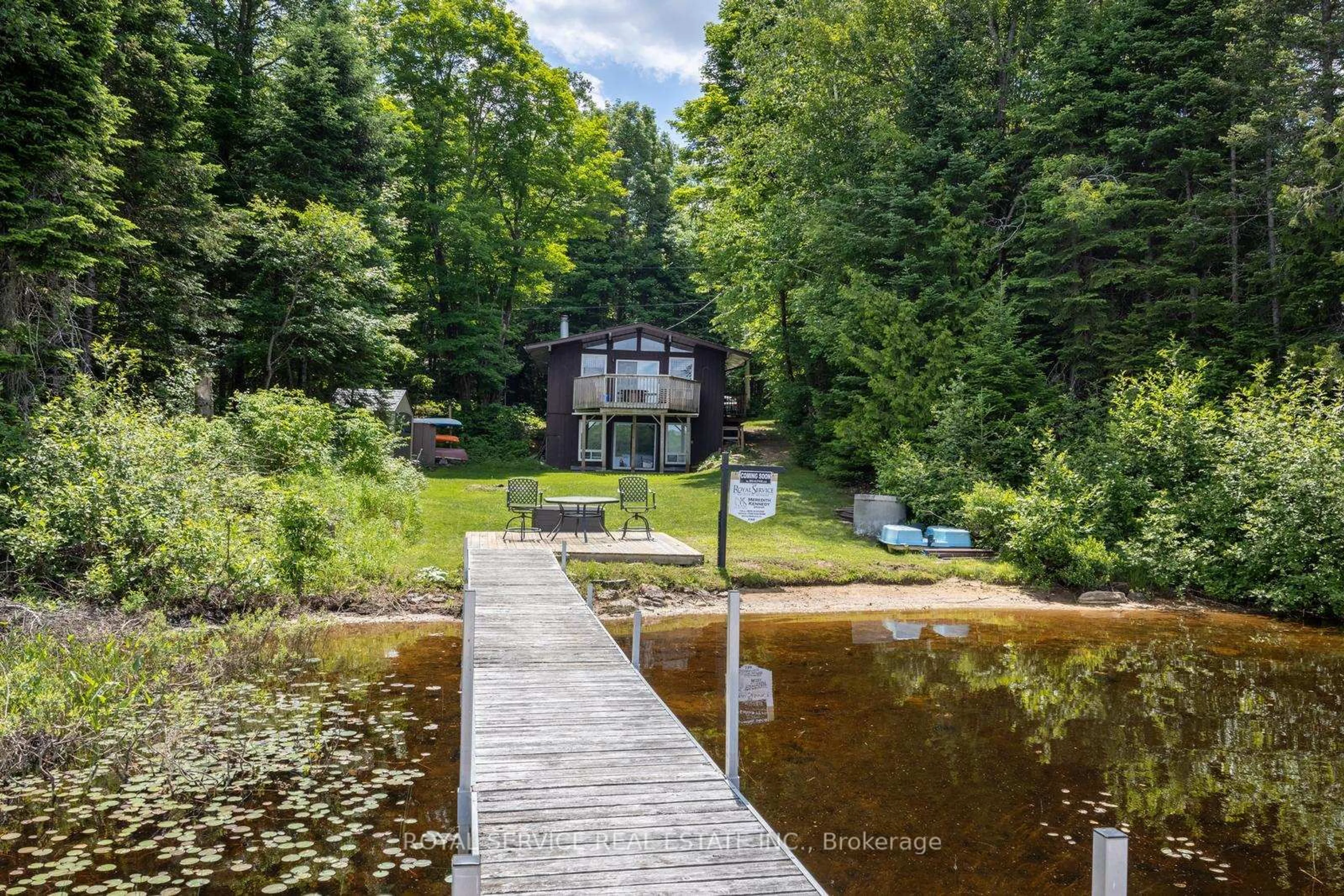 A pic from outside/outdoor area/front of a property/back of a property/a pic from drone, water/lake/river/ocean view for 2104 Brady Lake Rd, Minden Hills Ontario K0M 2K0