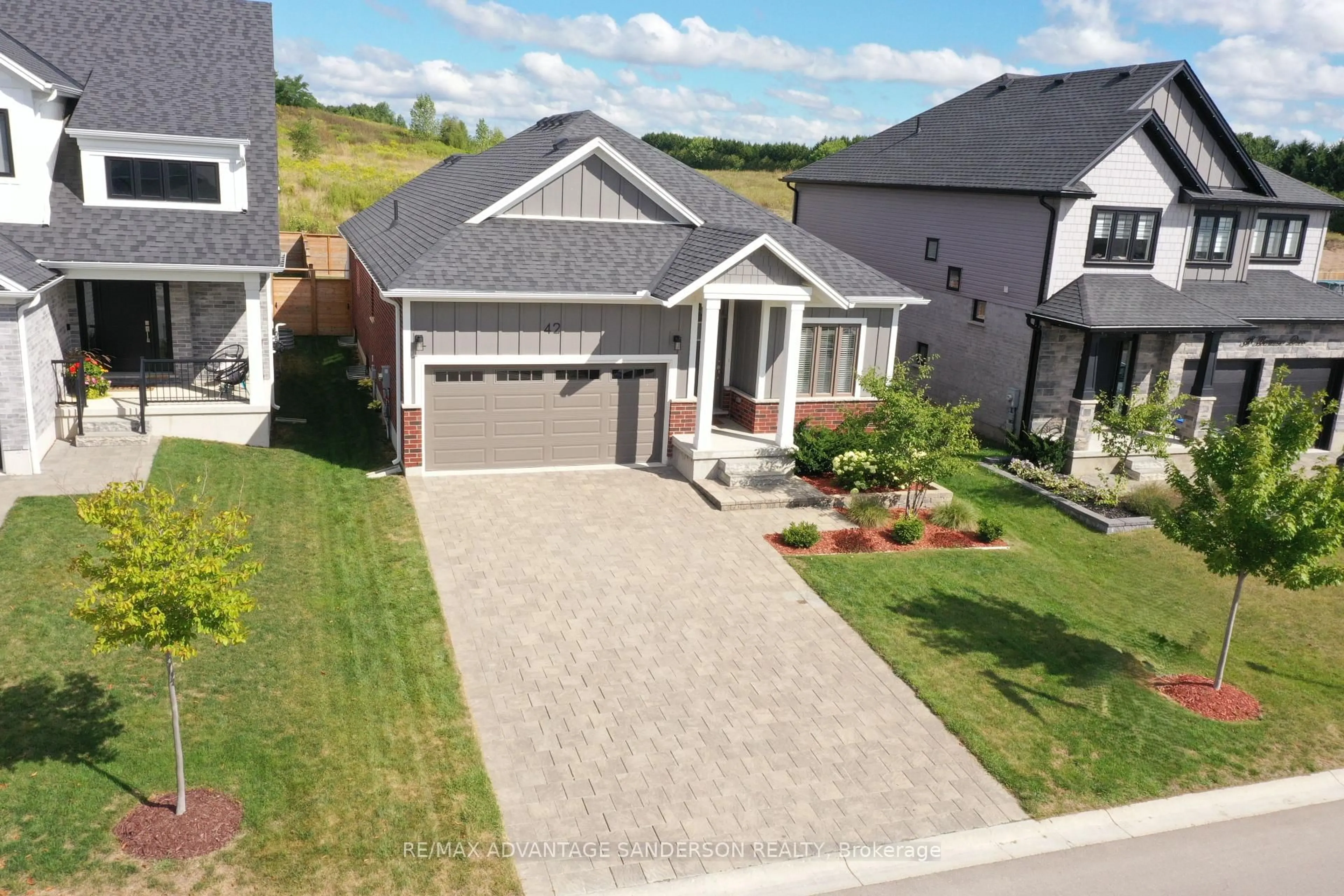 A pic from outside/outdoor area/front of a property/back of a property/a pic from drone, street for 42 Bowman Dr, Middlesex Centre Ontario N0M 2A0