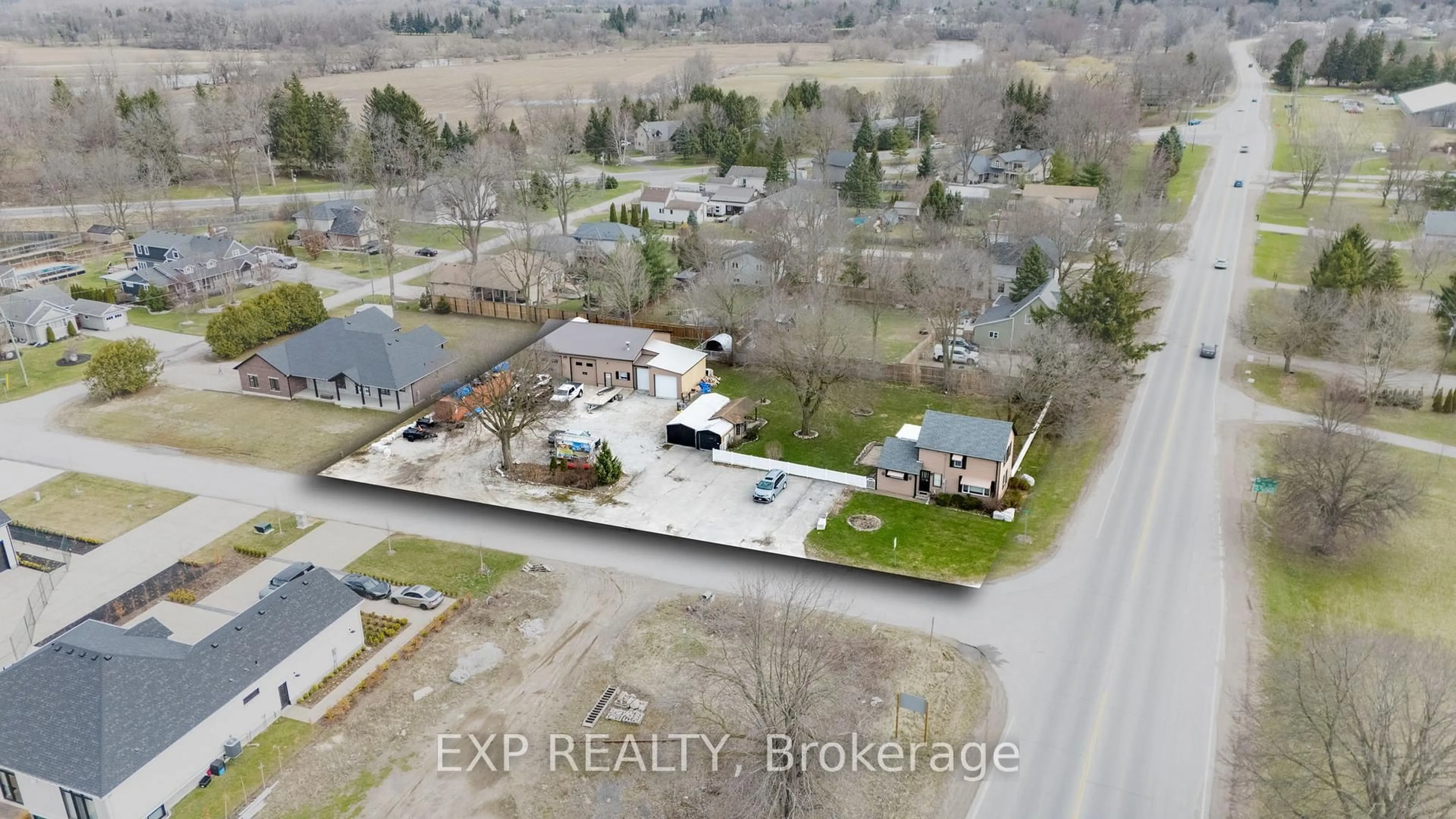 A pic from outside/outdoor area/front of a property/back of a property/a pic from drone, street for 21332 Wilson St, Middlesex Centre Ontario N0L 1E0