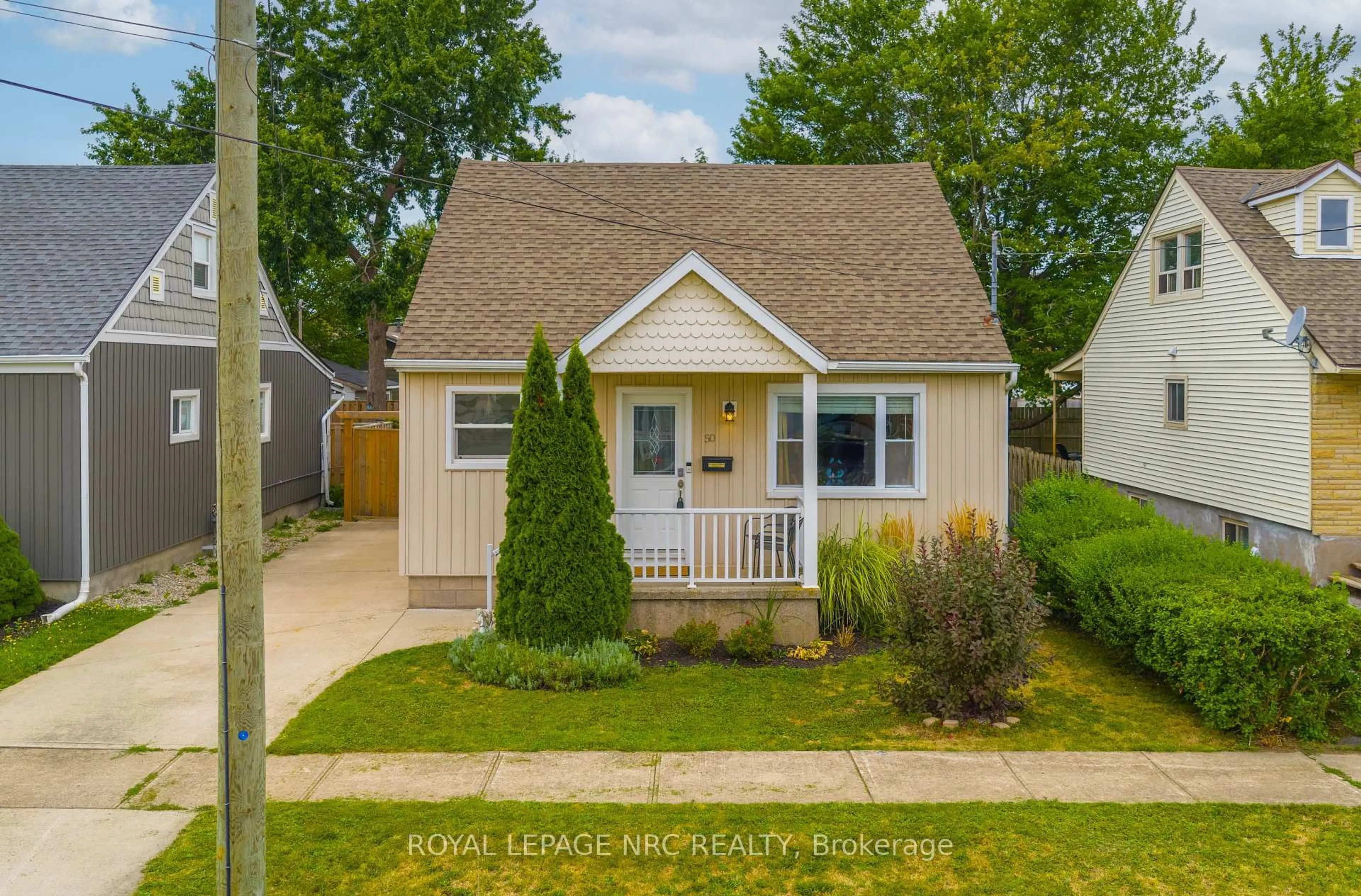 Home with vinyl exterior material, street for 50 Douglas St, Fort Erie Ontario L2A 3W5