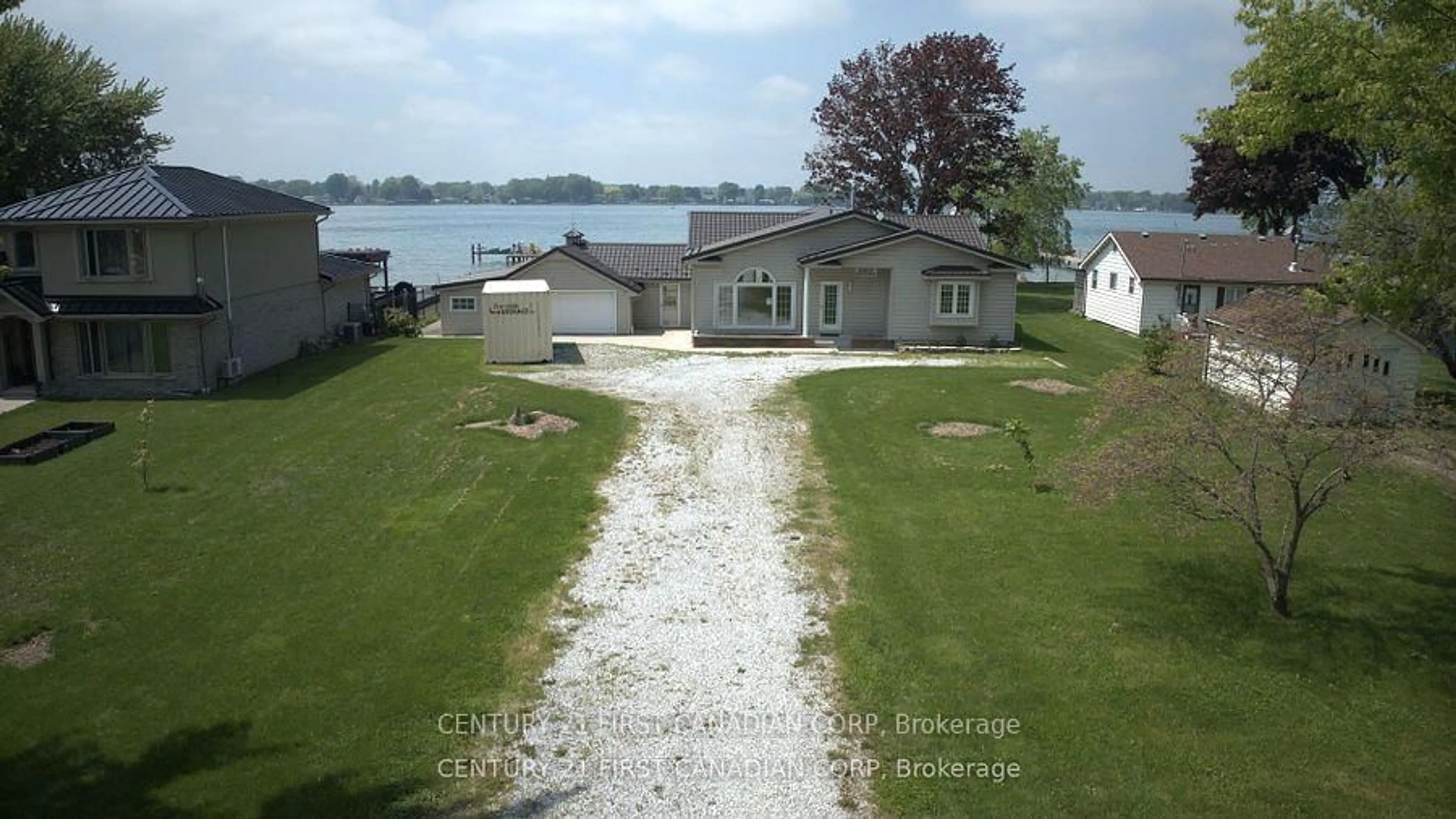 A pic from outside/outdoor area/front of a property/back of a property/a pic from drone, water/lake/river/ocean view for 3877 St Clair Pkwy, St. Clair Ontario N0P 2B0