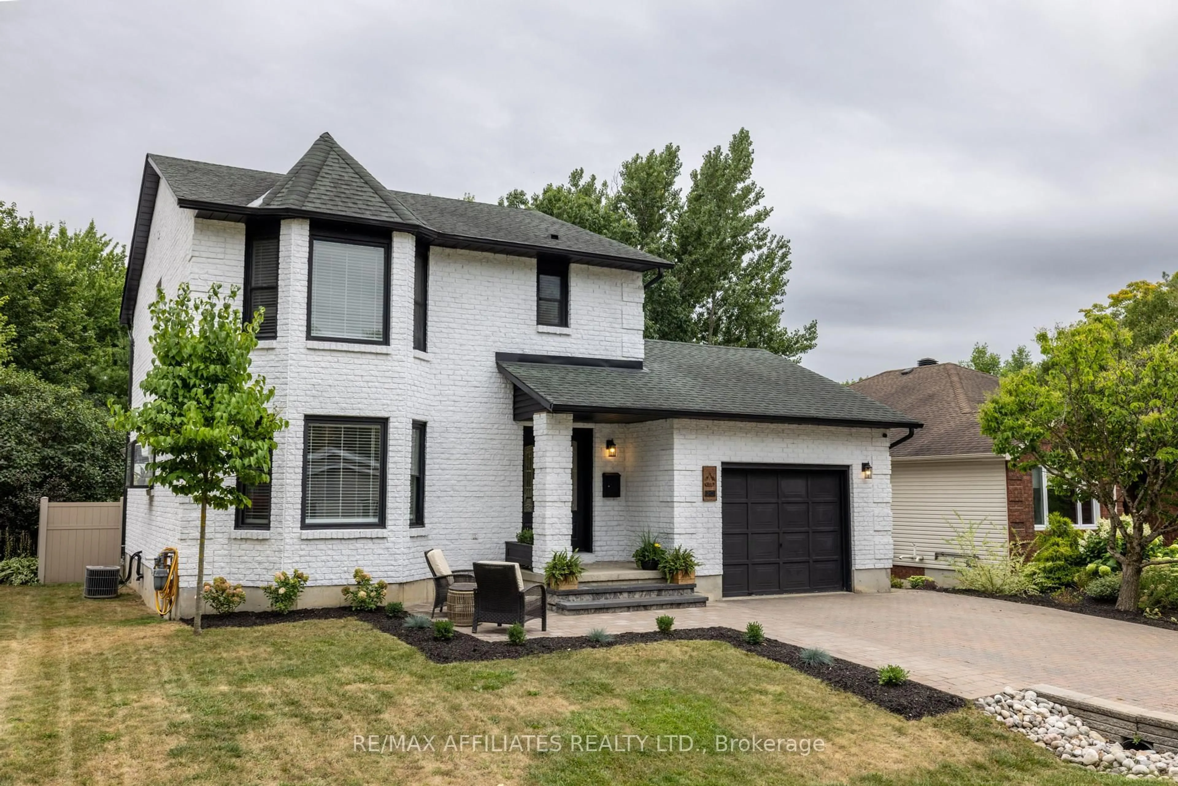 Home with vinyl exterior material, street for 2C Baxter Dr, Brockville Ontario K6V 3T8