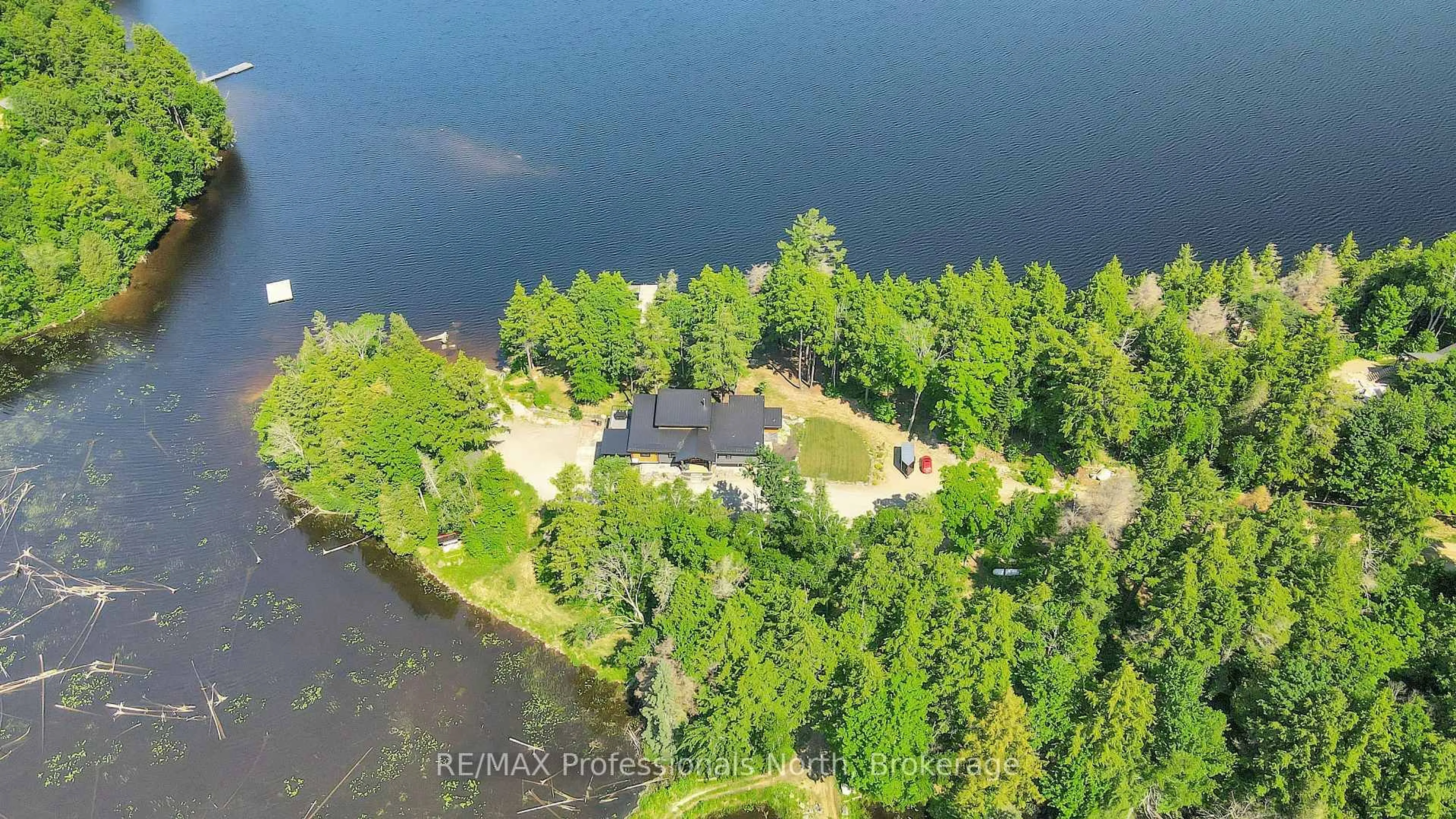 A pic from outside/outdoor area/front of a property/back of a property/a pic from drone, water/lake/river/ocean view for 1046 Lone Wolf Cres, Dysart et al Ontario K0M 1S0
