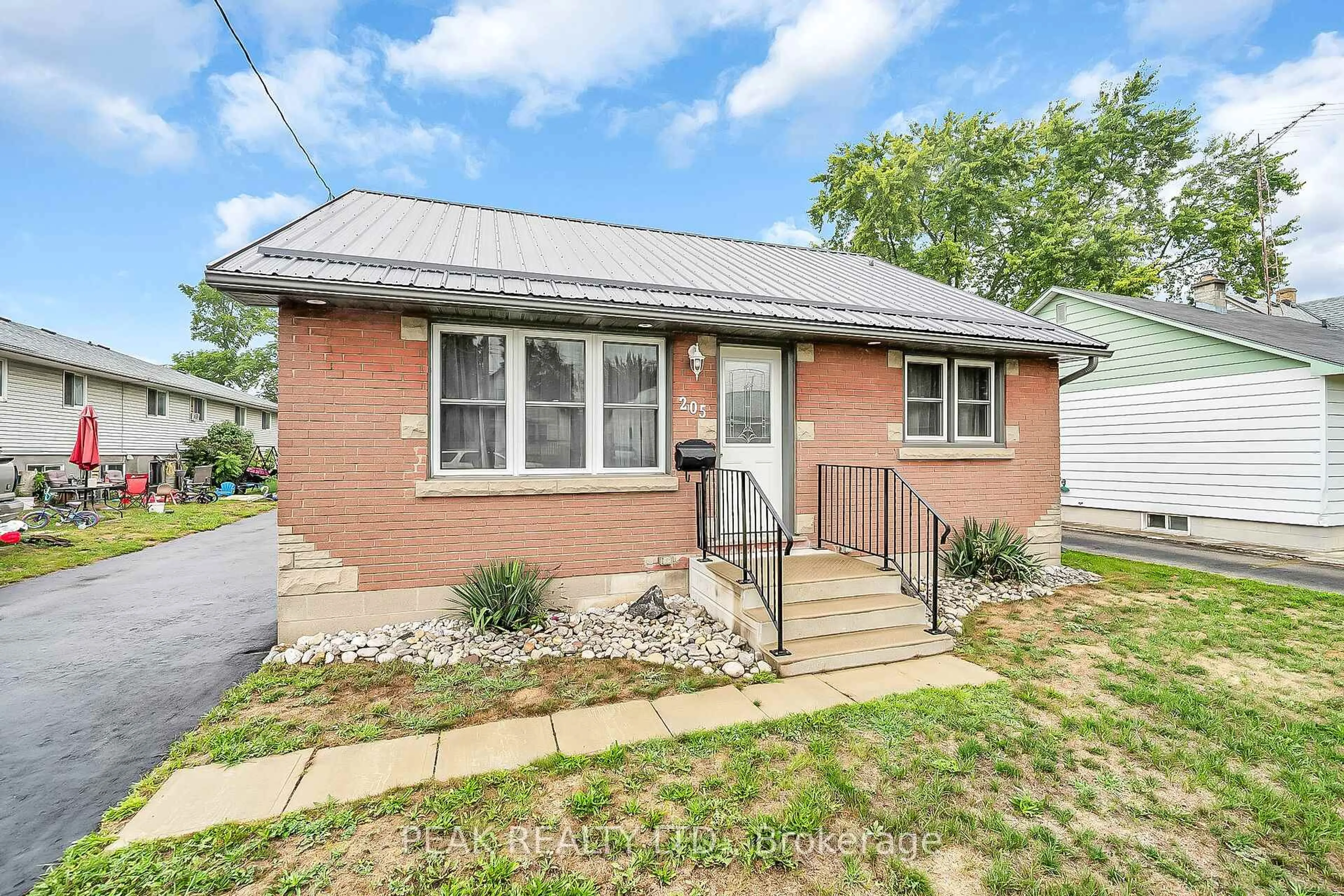 Home with brick exterior material, street for 205 Crysler St, Norfolk Ontario N4B 1H9