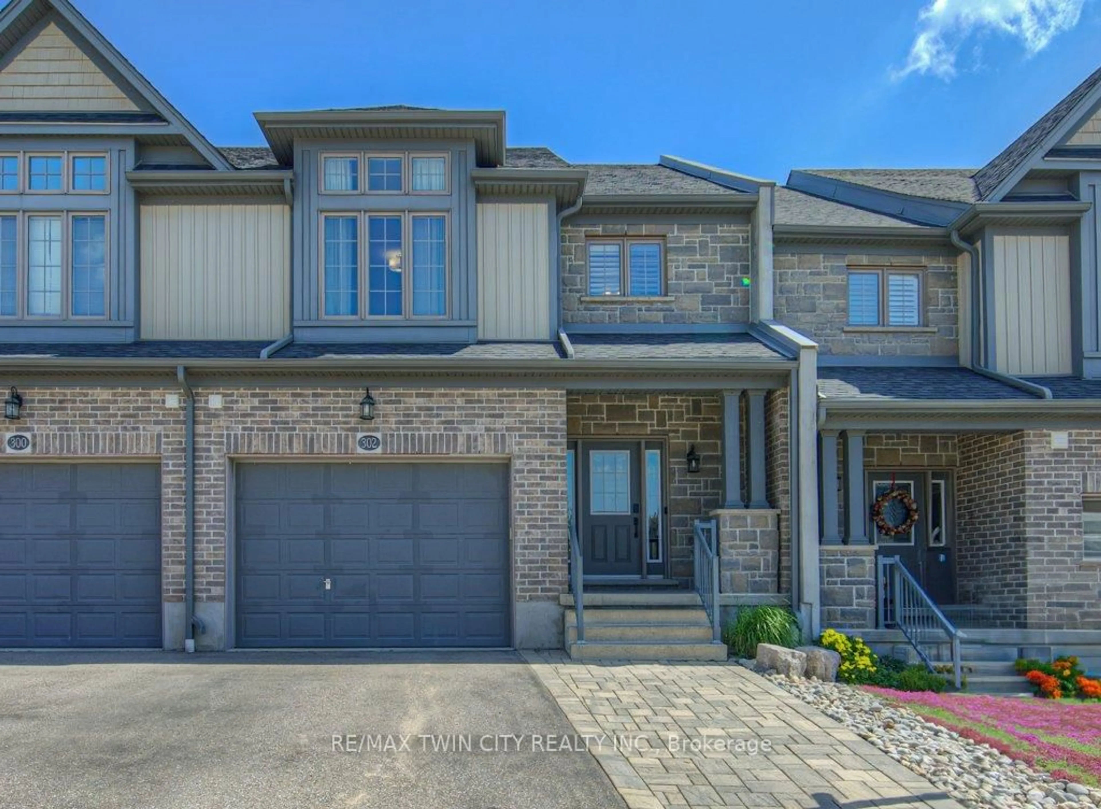 Home with brick exterior material, street for 302 Ginseng St, Waterloo Ontario N2V 0B3