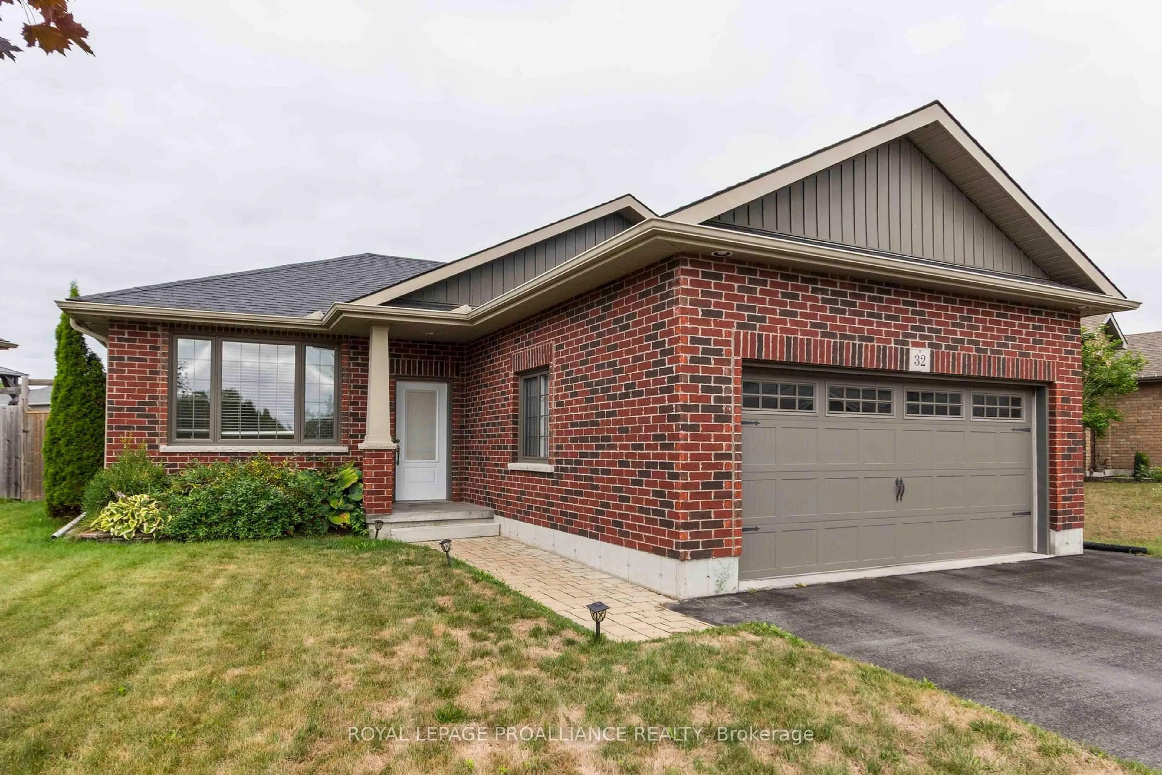 Home with brick exterior material, street for 32 Aspen Dr, Quinte West Ontario K8V 0E2