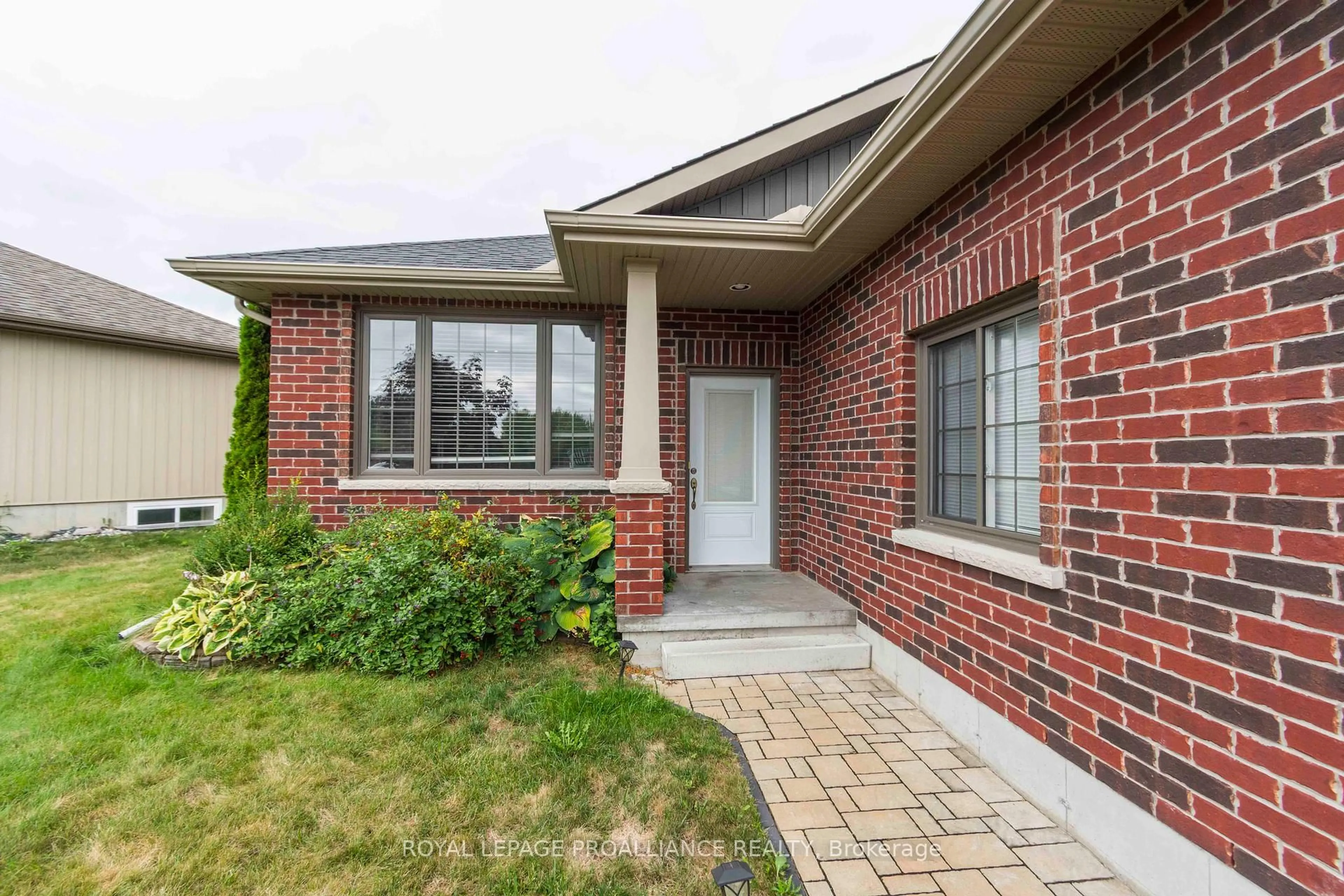 Home with brick exterior material, street for 32 Aspen Dr, Quinte West Ontario K8V 0E2
