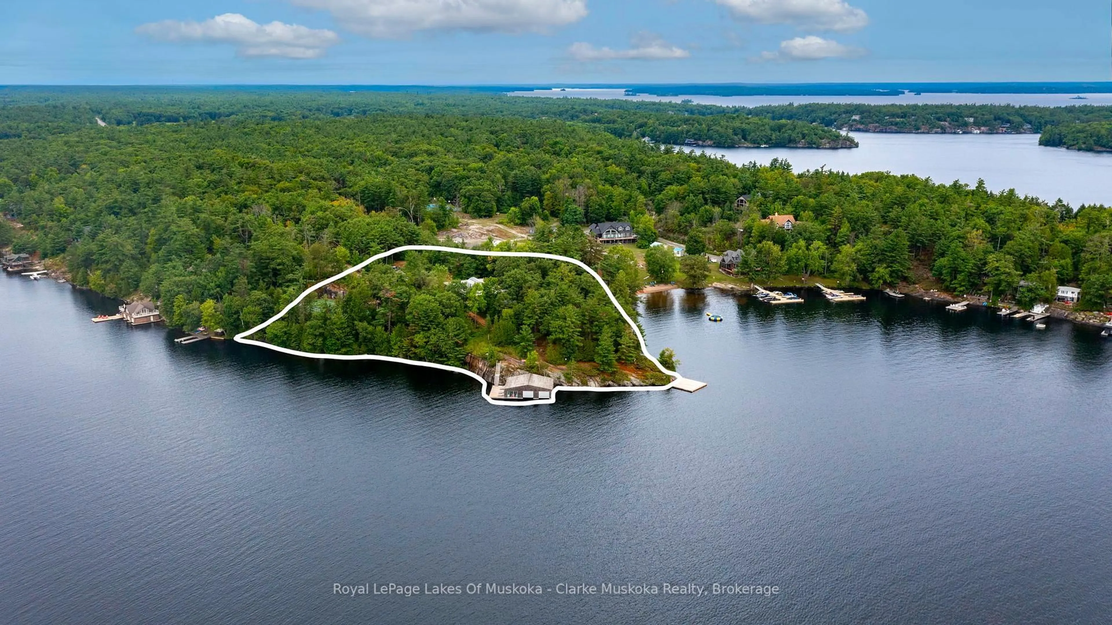 A pic from outside/outdoor area/front of a property/back of a property/a pic from drone, water/lake/river/ocean view for 1114 Road 3200, Gravenhurst Ontario P1P 1R2
