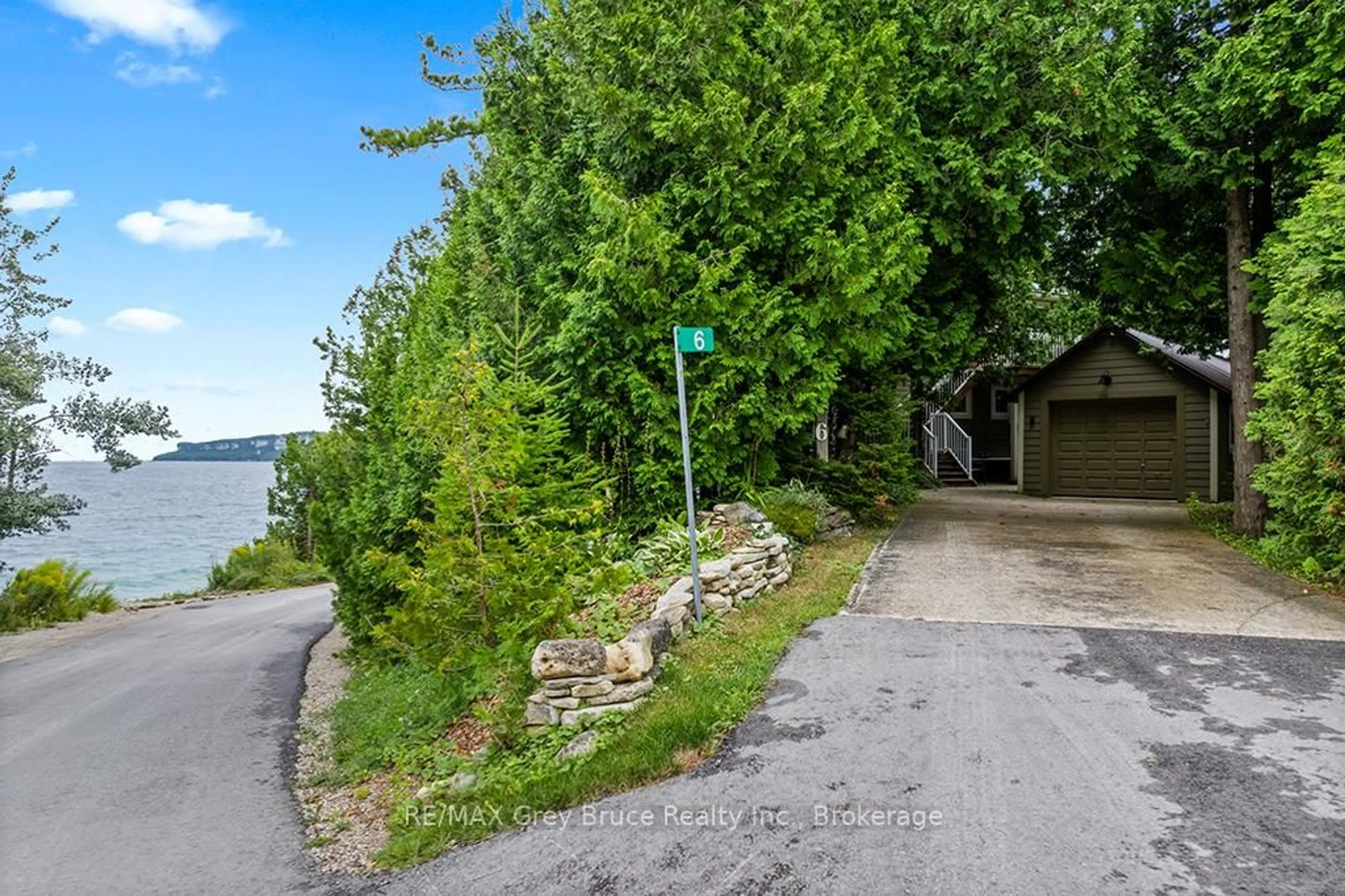 A pic from outside/outdoor area/front of a property/back of a property/a pic from drone, water/lake/river/ocean view for 6 Chetwynd Lane, Northern Bruce Peninsula Ontario N0H 1W0