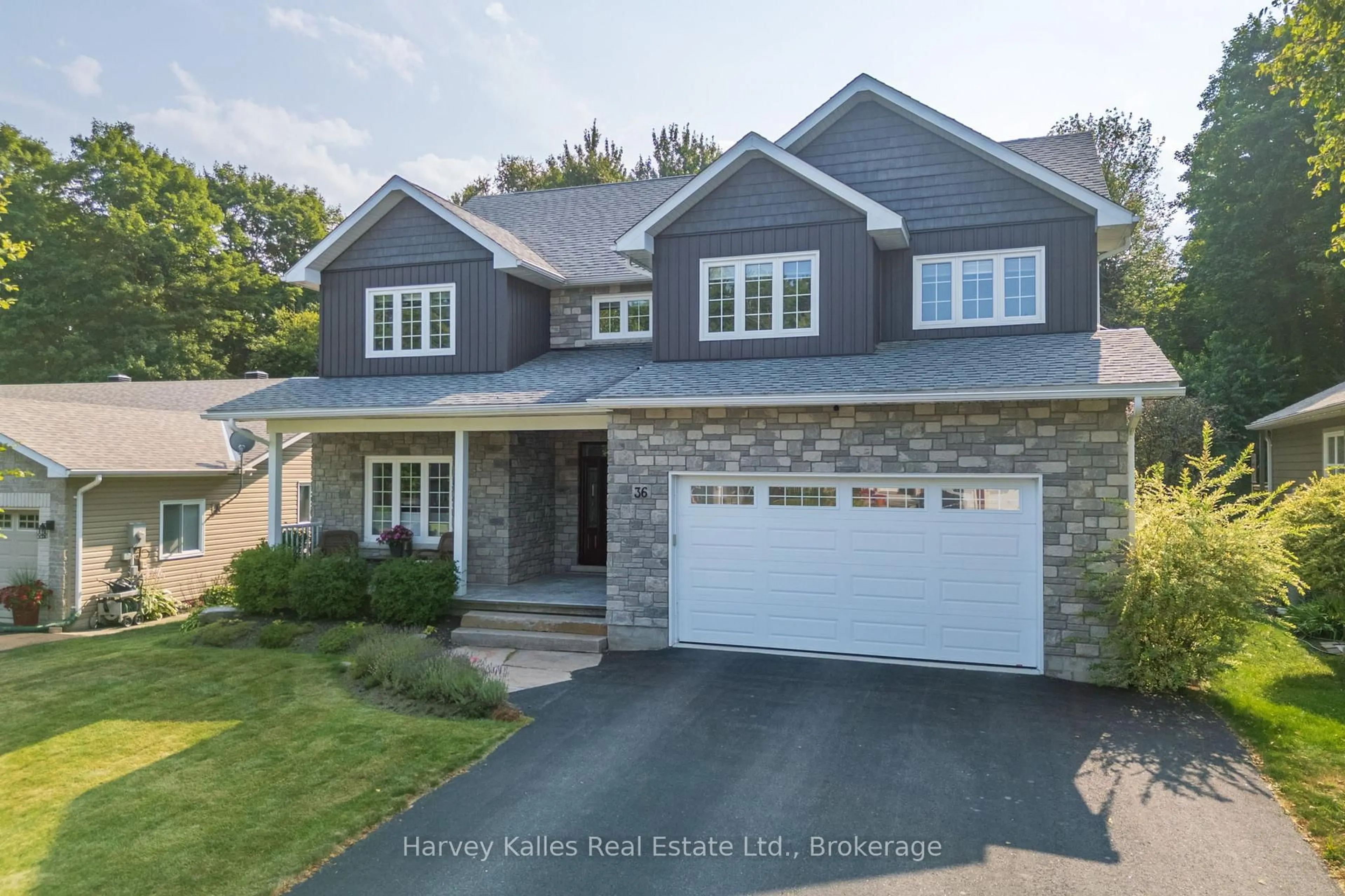 Home with vinyl exterior material, street for 36 Homestead Lane, Huntsville Ontario P1H 2N8