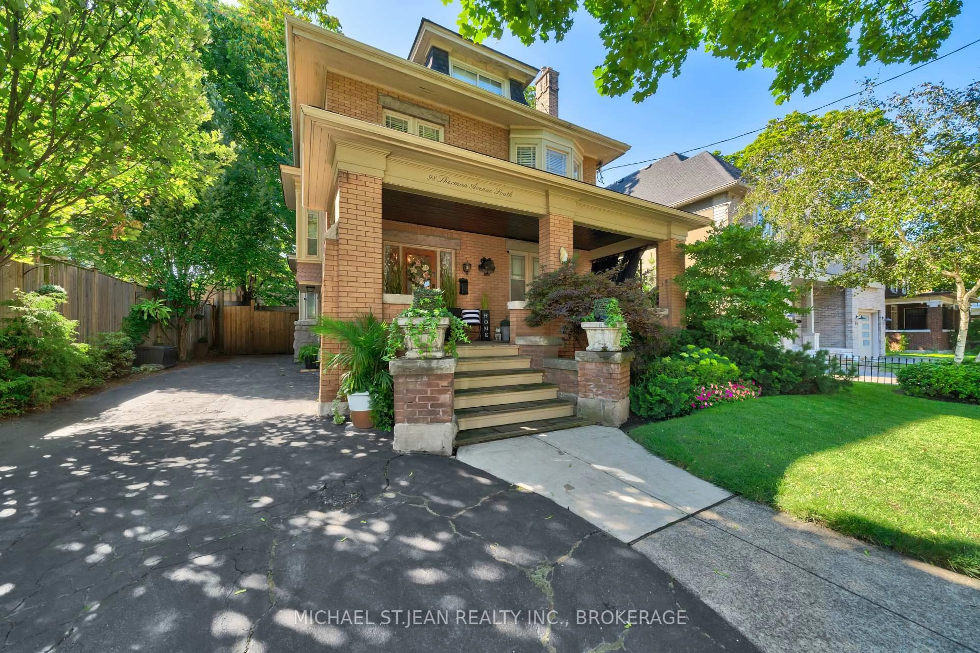 Home with brick exterior material, street for 98 Sherman Ave, Hamilton Ontario L8M 2P7