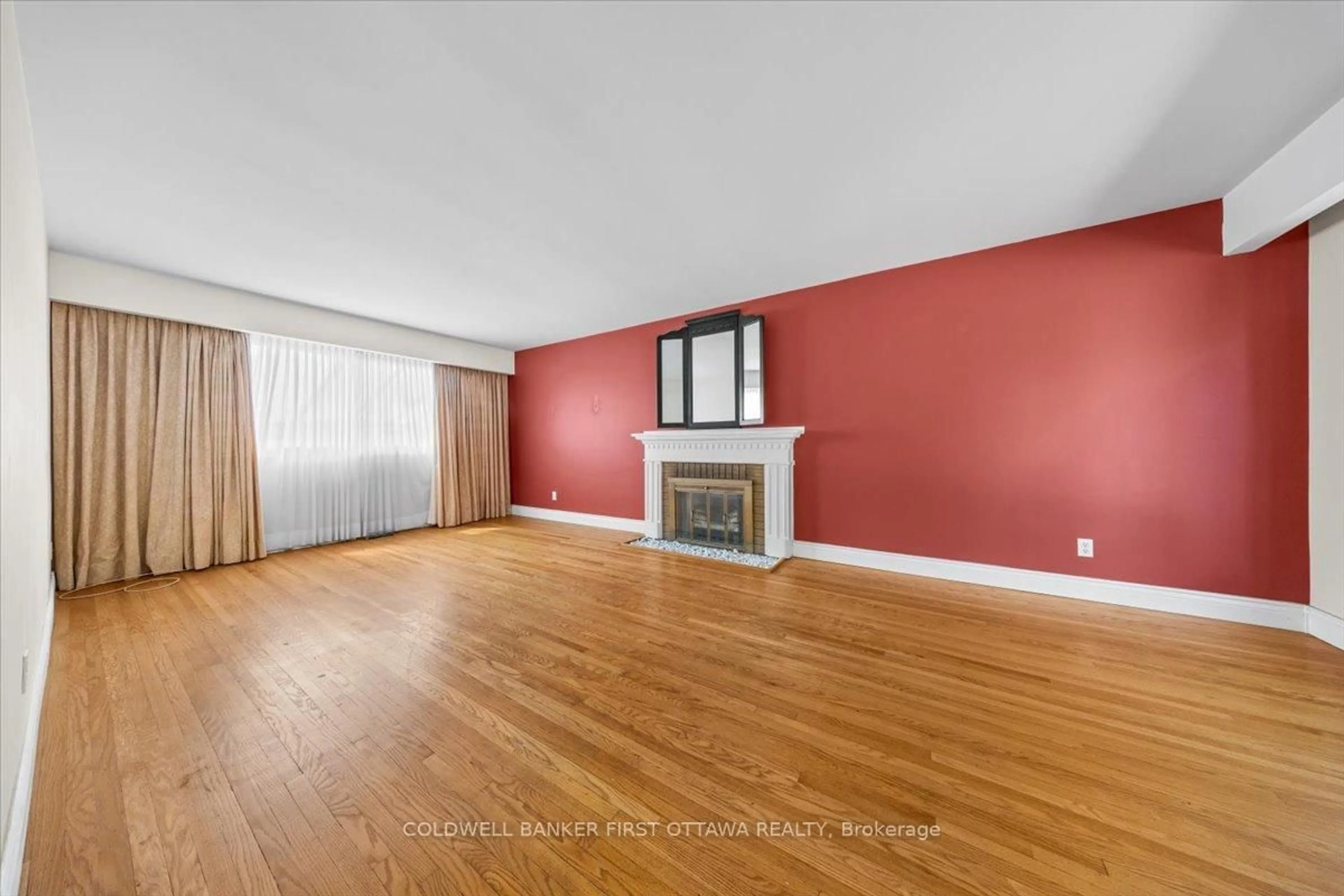 Living room with furniture, wood/laminate floor for 2326 Harding Rd, Ottawa Ontario K1G 3B9