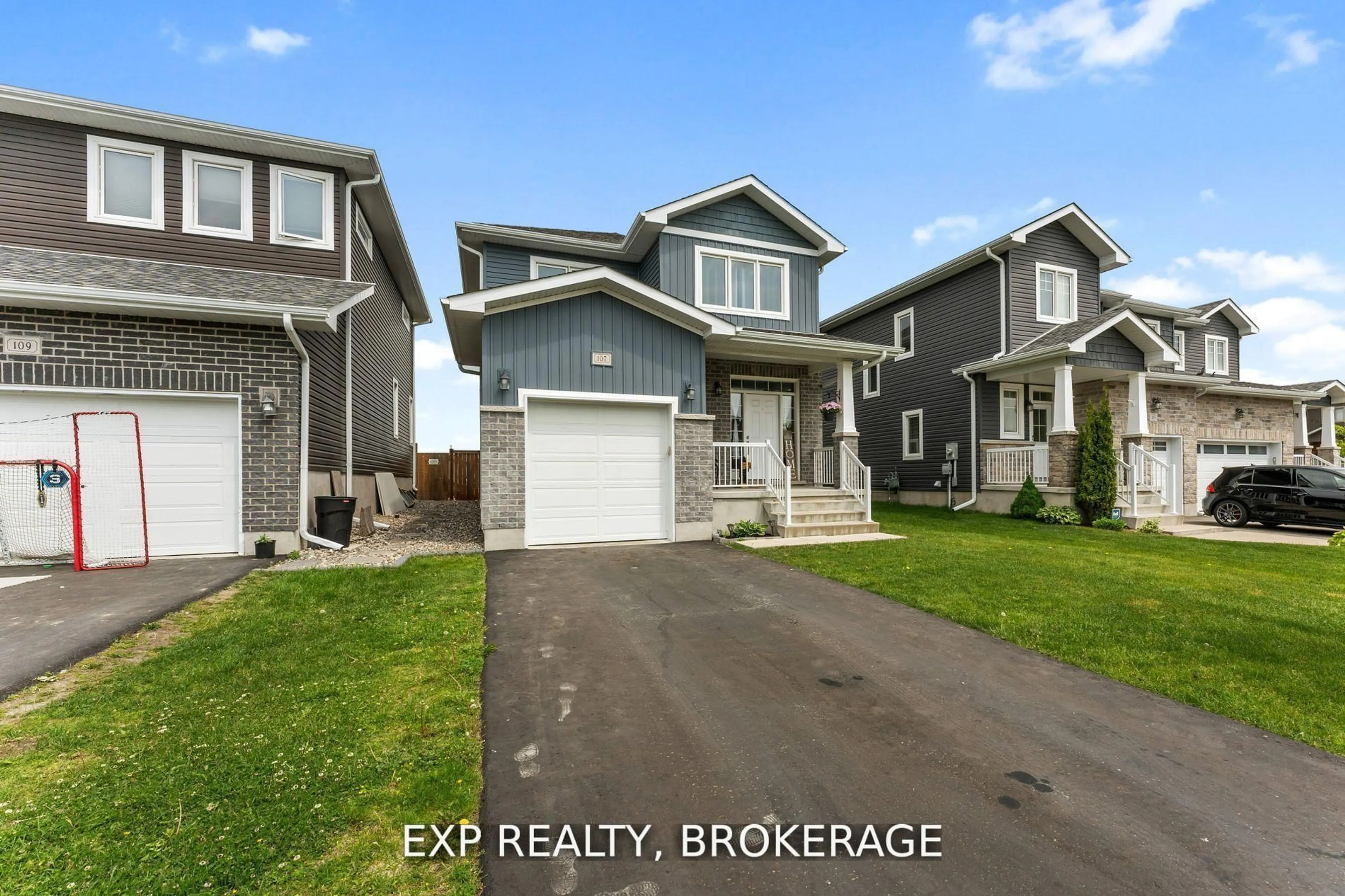A pic from outside/outdoor area/front of a property/back of a property/a pic from drone, street for 107 Hazlett St, Loyalist Ontario K7N 0C1