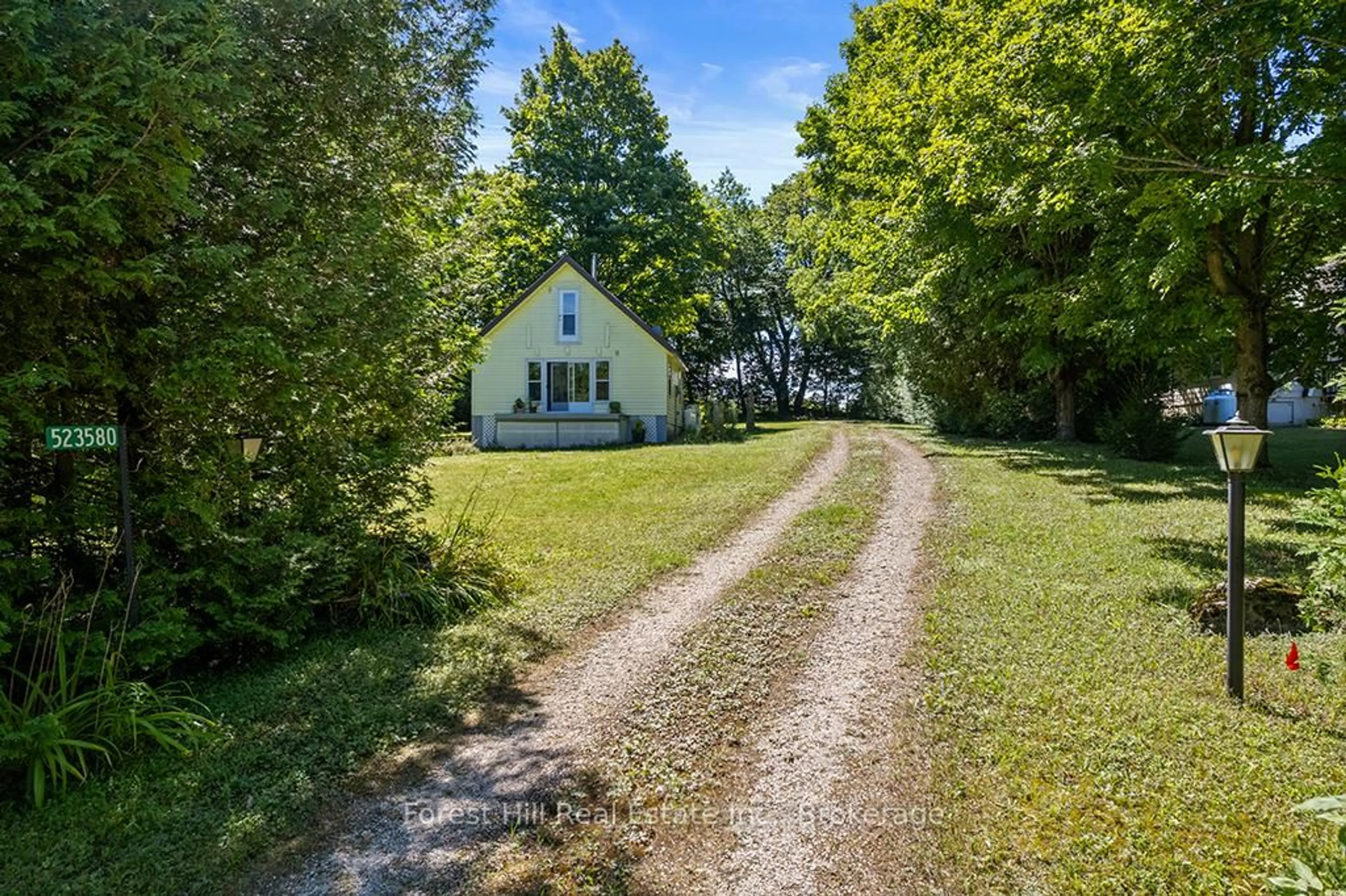 A pic from outside/outdoor area/front of a property/back of a property/a pic from drone, street for 523580 12th Concession, West Grey Ontario N0C 1H0