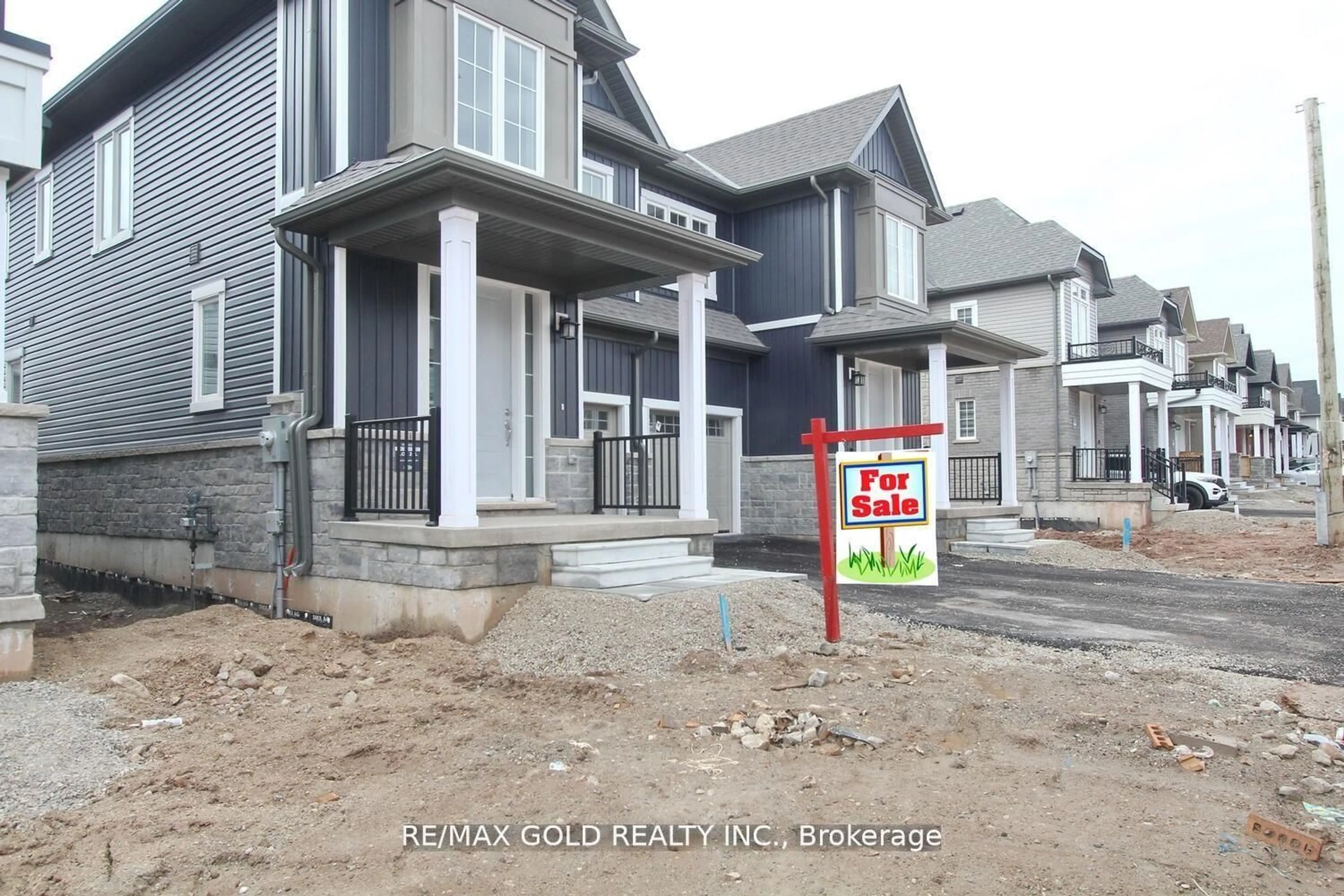 Home with vinyl exterior material, street for 127 Molozzi St, Erin Ontario N0B 1T0