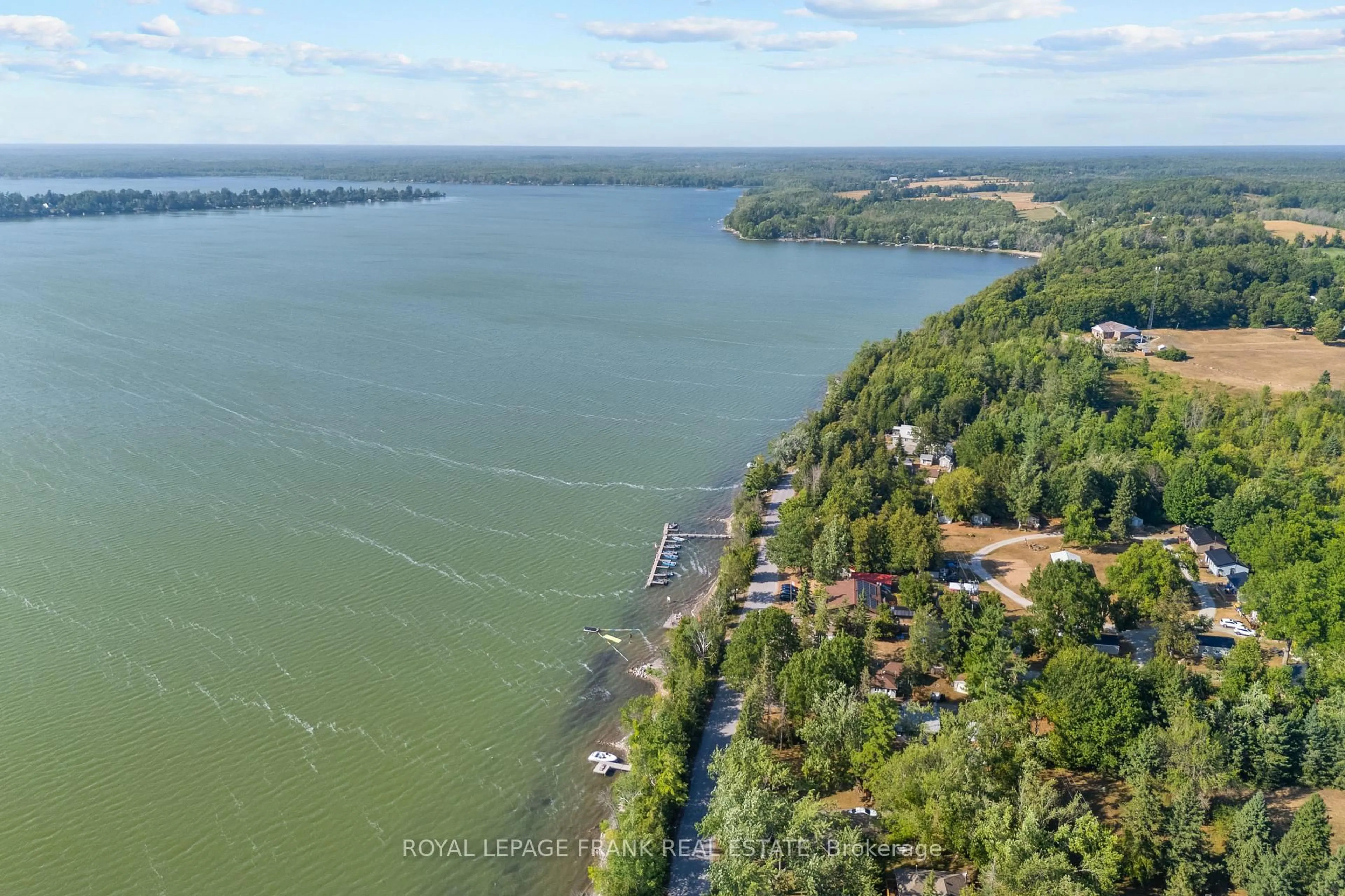 A pic from outside/outdoor area/front of a property/back of a property/a pic from drone, water/lake/river/ocean view for 230-232 Lake Dalrymple Rd #7, Kawartha Lakes Ontario L0K 1W0