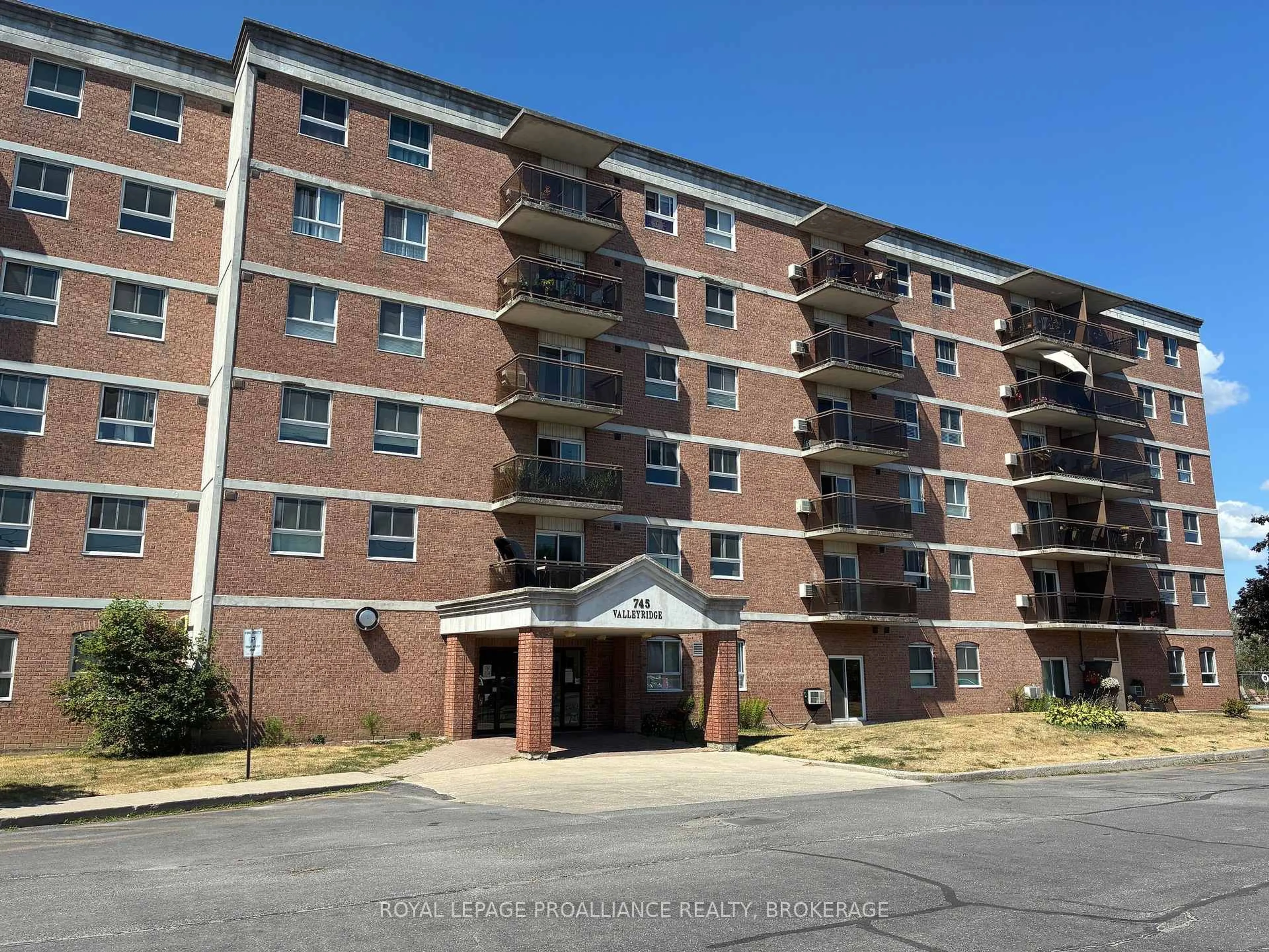 A pic from outside/outdoor area/front of a property/back of a property/a pic from drone, building for 745 Davis Dr #206, Kingston Ontario K7M 8J4