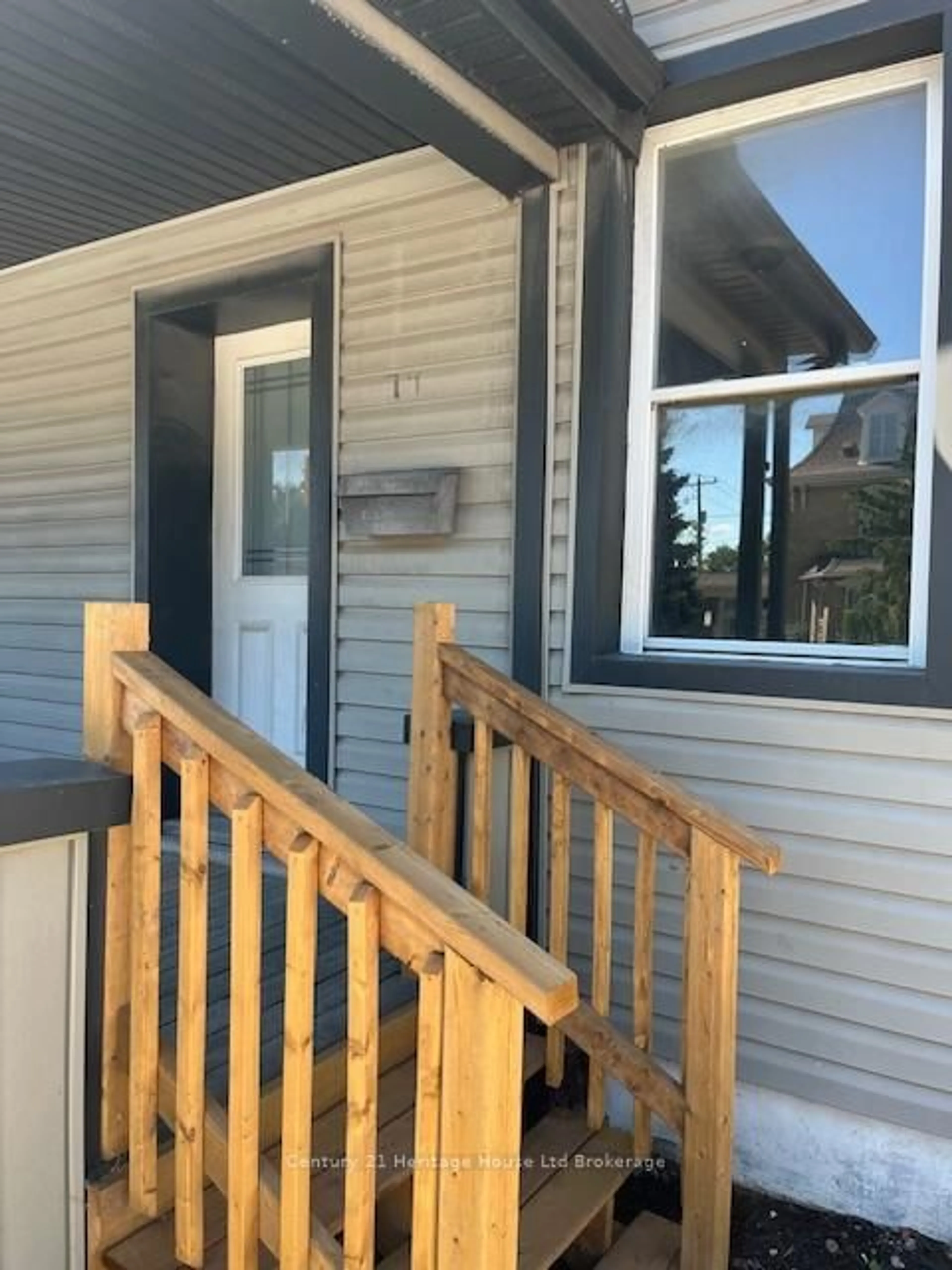 Home with vinyl exterior material, street for 74 Wilson St, Woodstock Ontario N4S 3N5