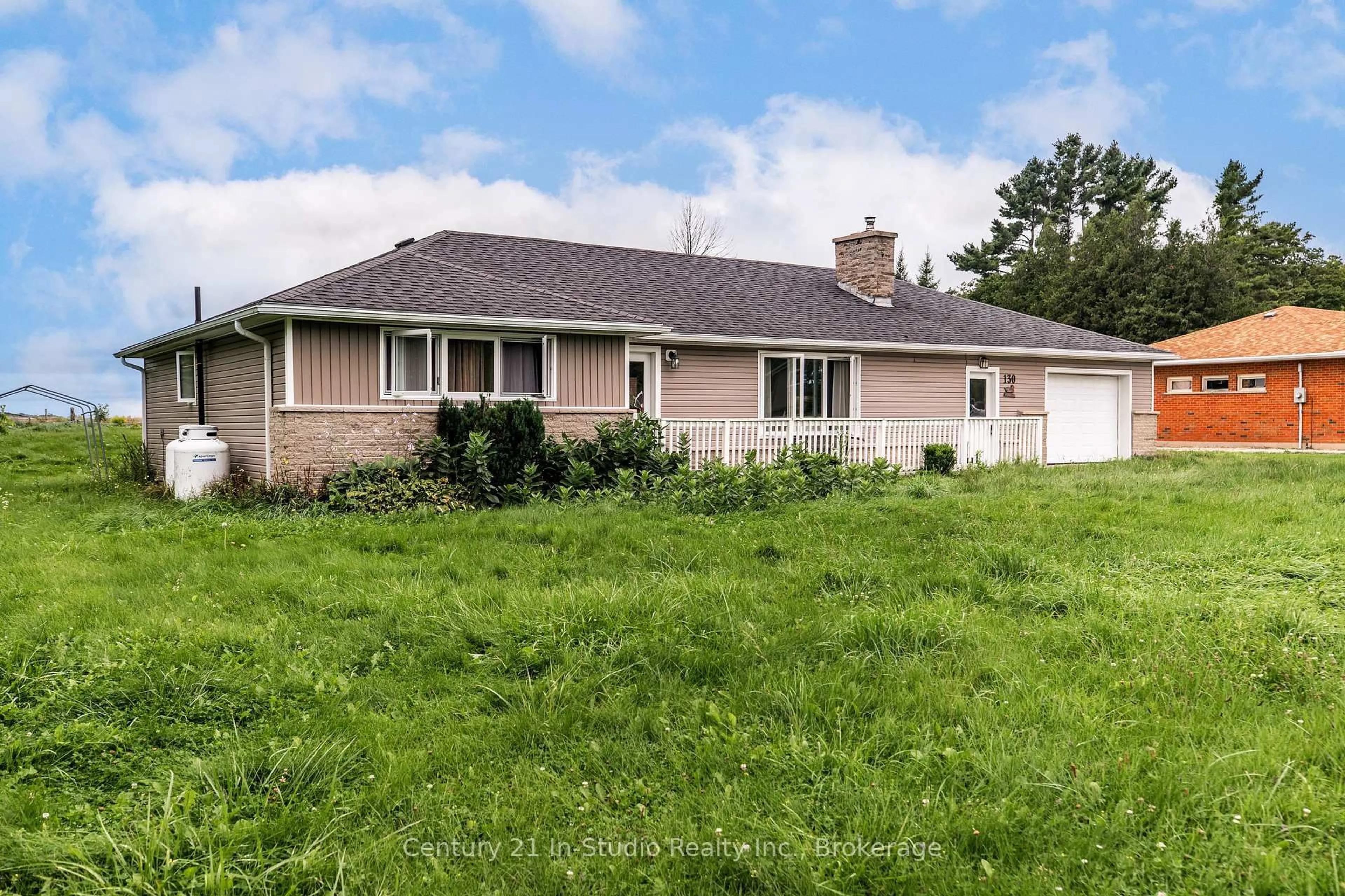 A pic from outside/outdoor area/front of a property/back of a property/a pic from drone, street for 130 MAIN St, Northern Bruce Peninsula Ontario N0H 1W0