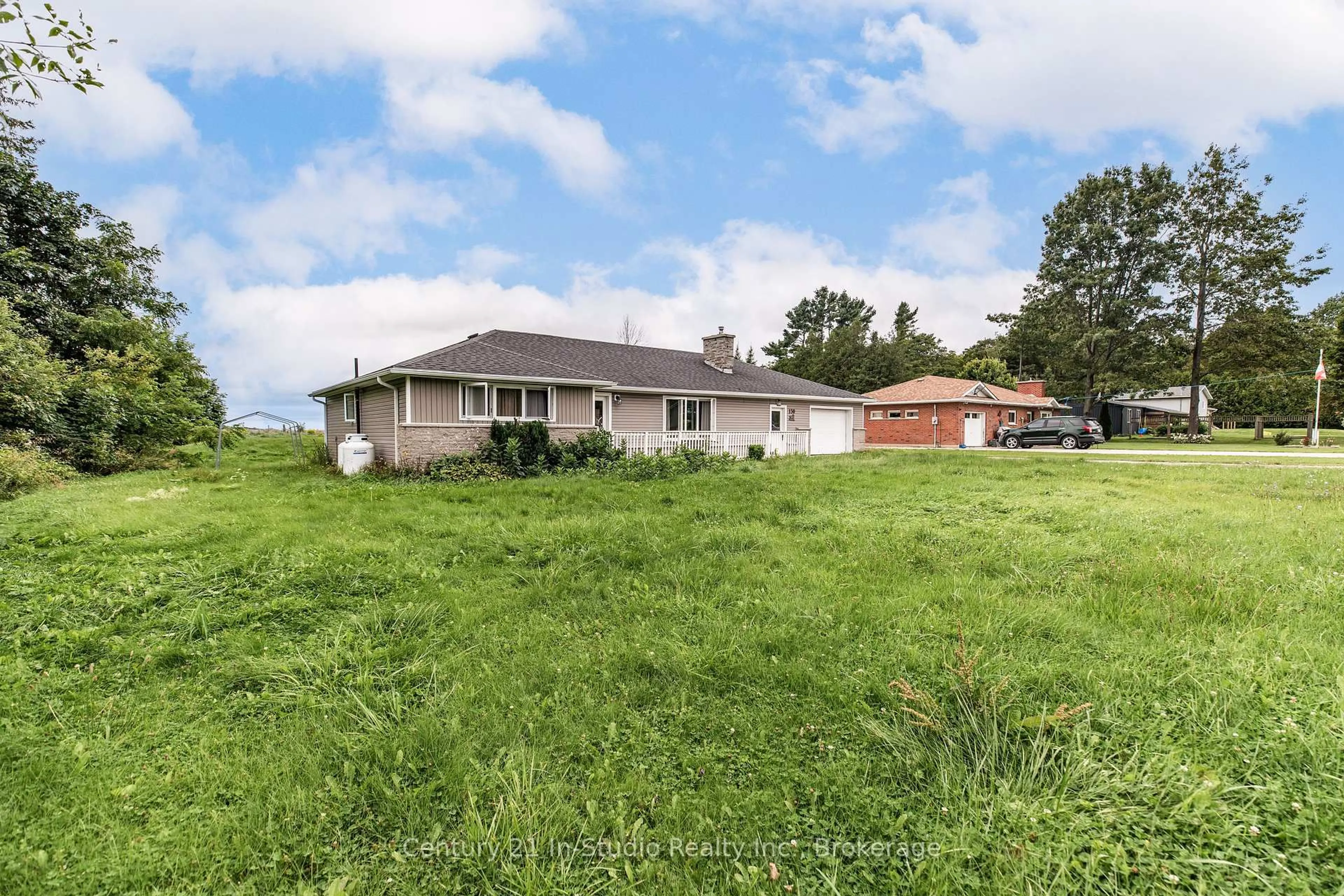 A pic from outside/outdoor area/front of a property/back of a property/a pic from drone, water/lake/river/ocean view for 130 MAIN St, Northern Bruce Peninsula Ontario N0H 1W0