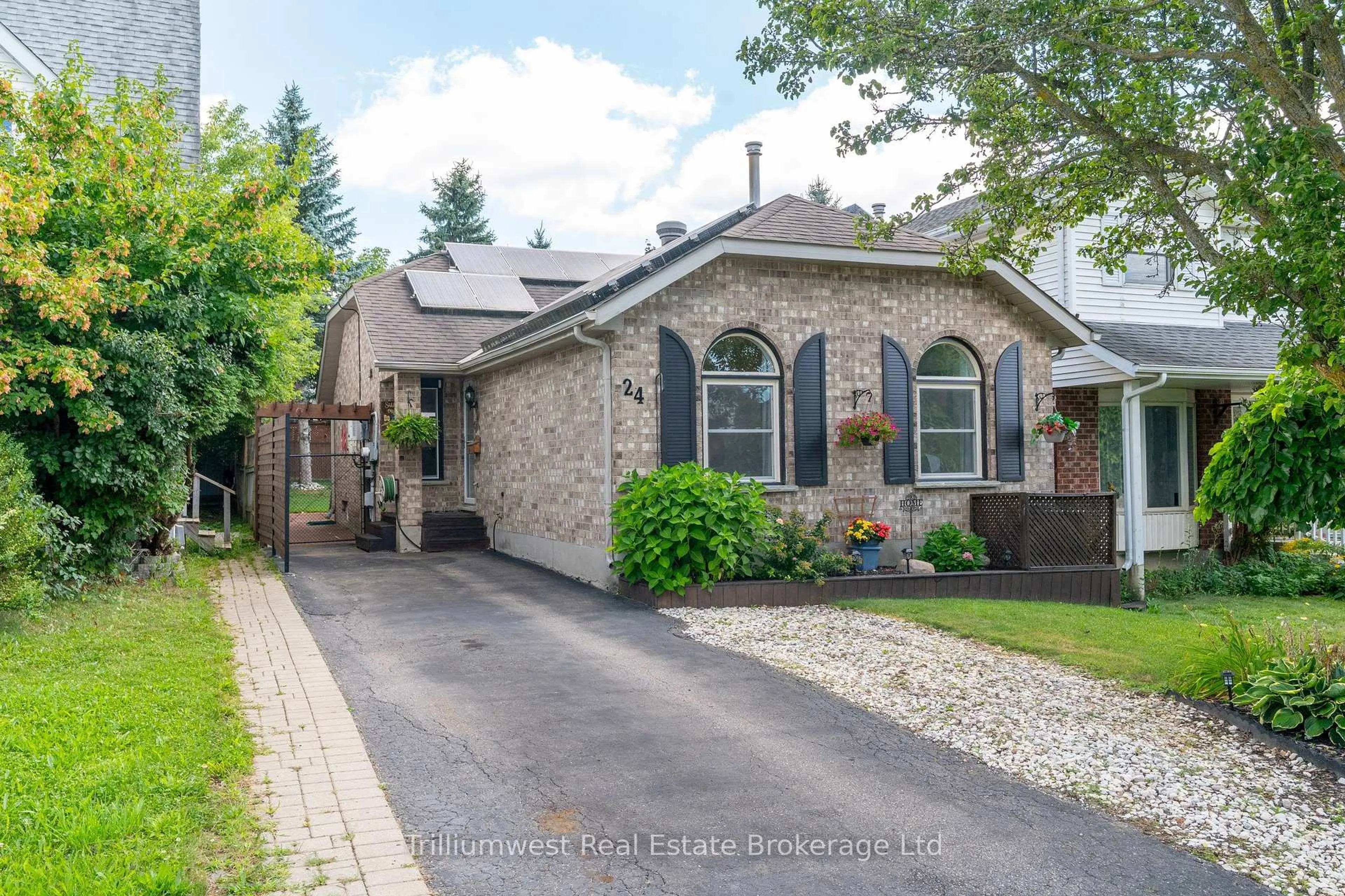 Home with brick exterior material, street for 24 Sidney Cres, Guelph Ontario N1G 4V1
