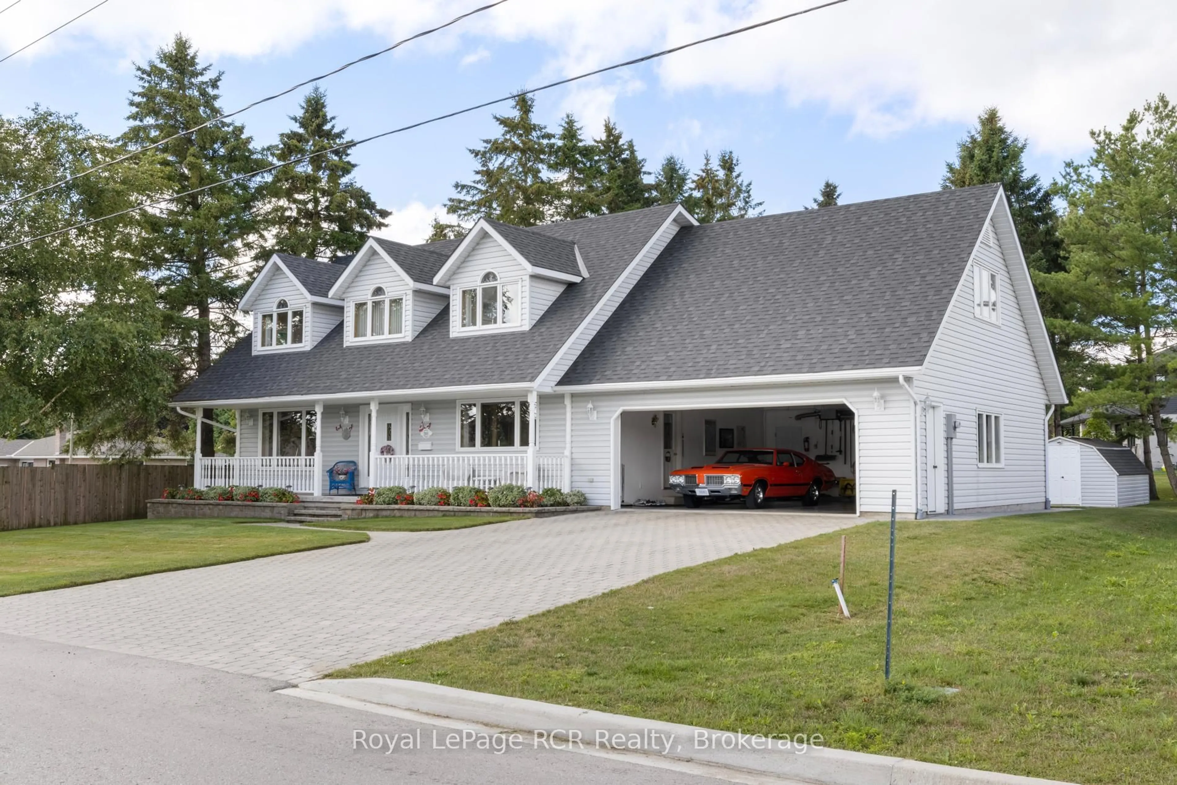 Home with vinyl exterior material, street for 201 Church St, Wellington North Ontario N0G 2L0
