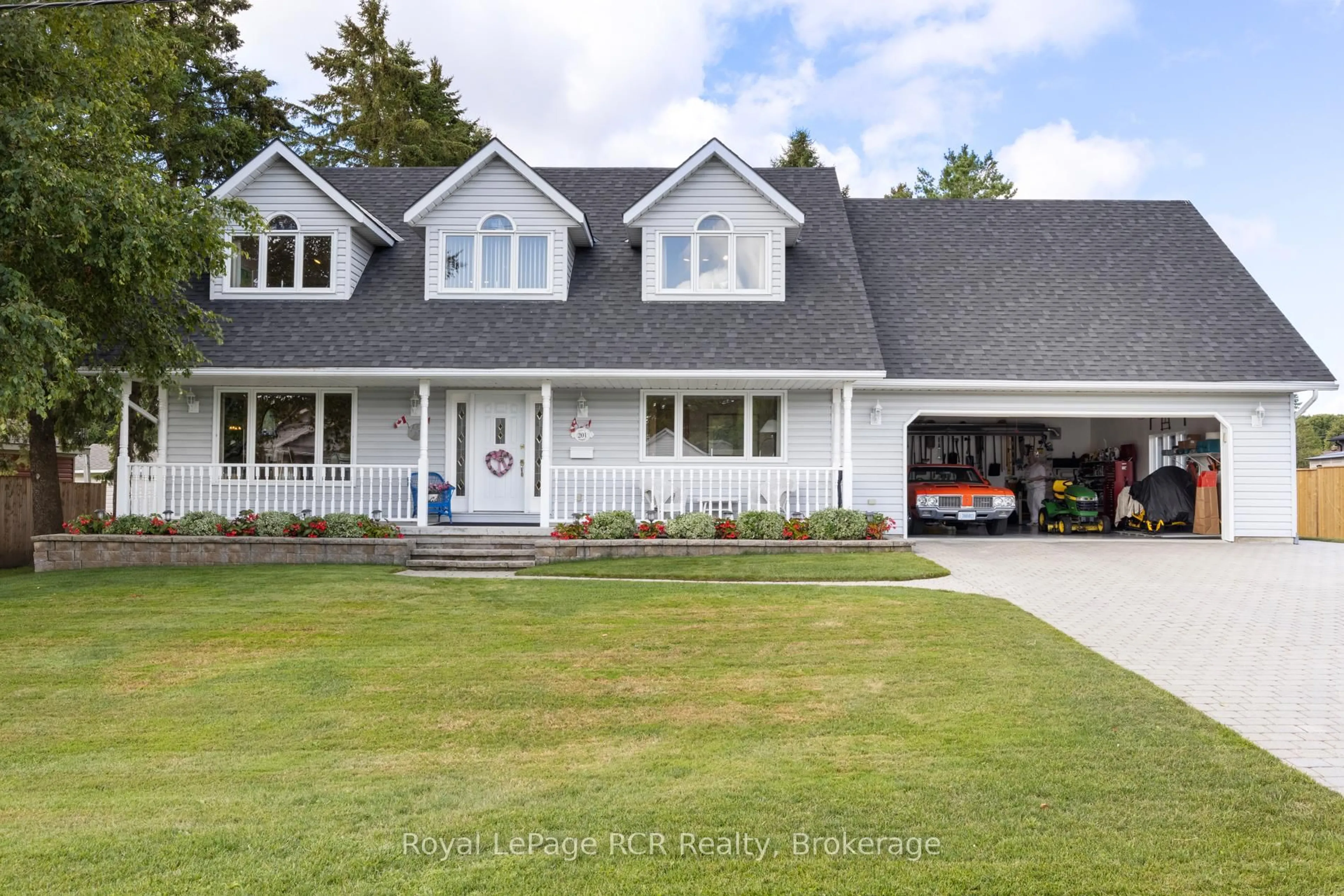 Home with vinyl exterior material, street for 201 Church St, Wellington North Ontario N0G 2L0