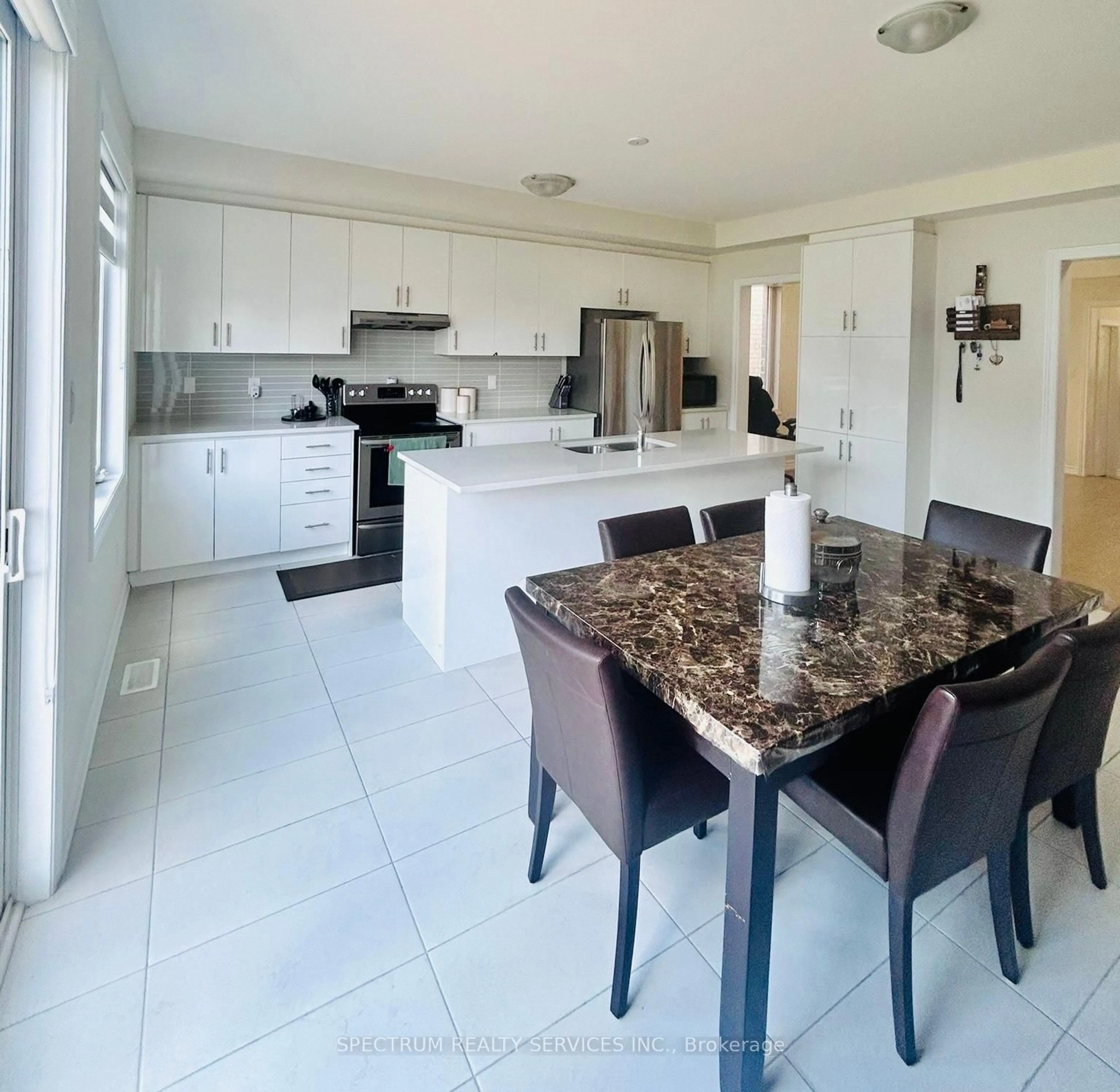 Open concept kitchen, ceramic/tile floor for 52 Granka St, Brantford Ontario N3T 0X5