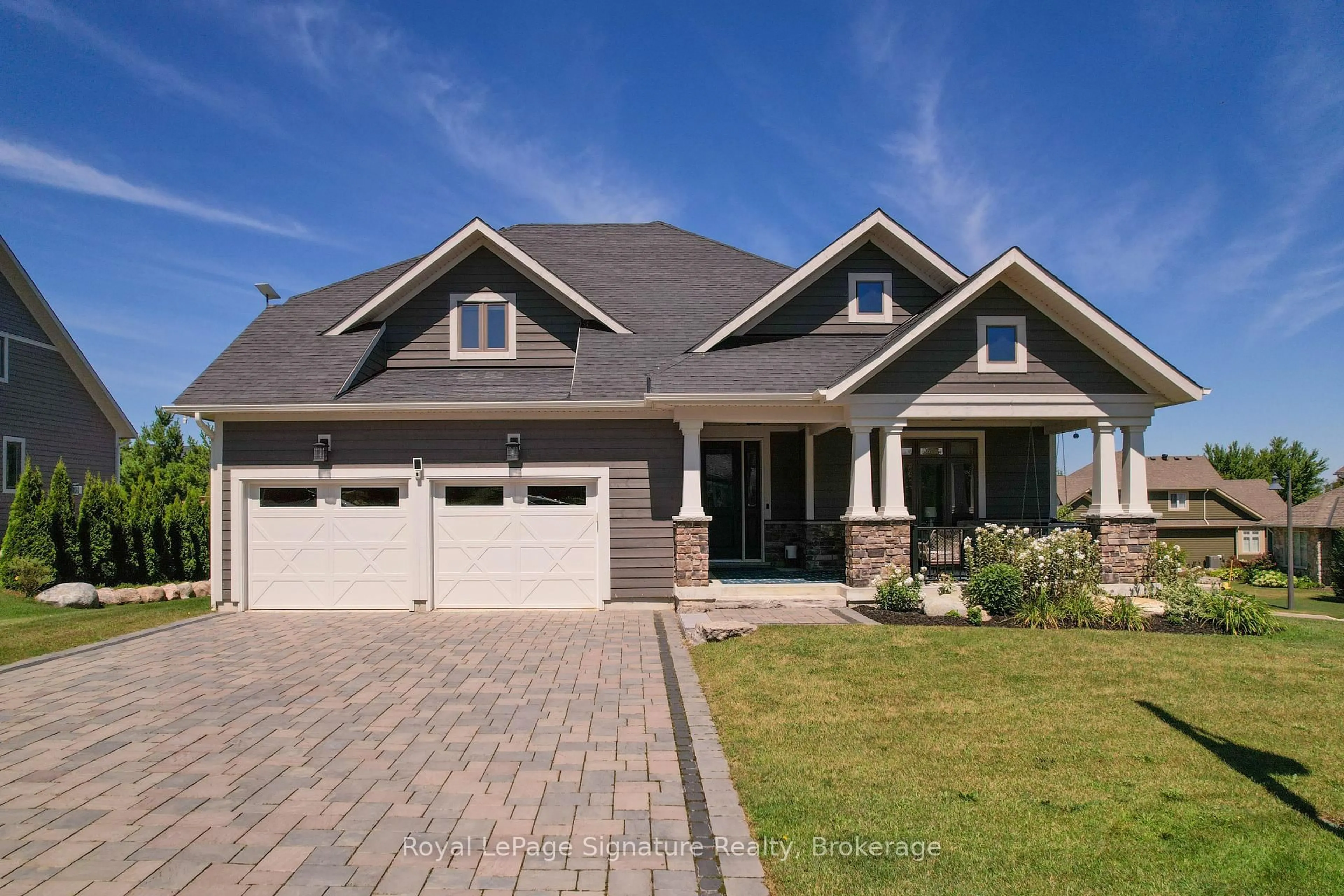 Home with brick exterior material, street for 113 Landry Lane, Blue Mountains Ontario N0H 2P0