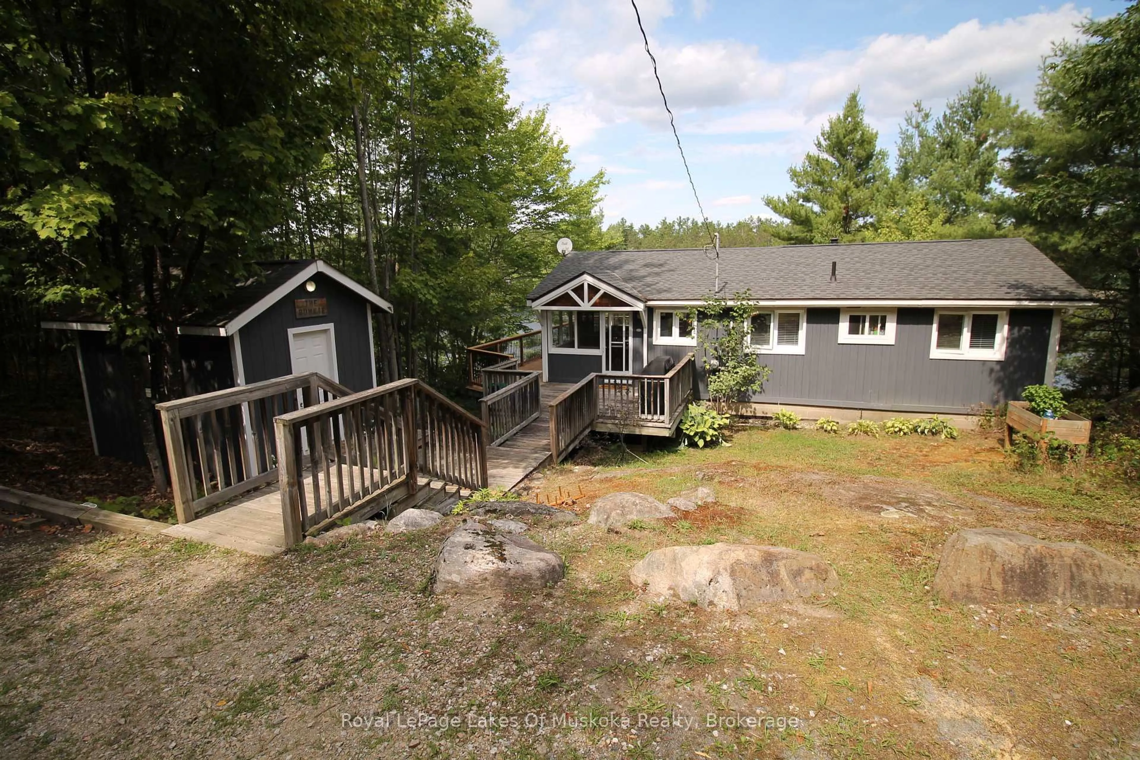 A pic from outside/outdoor area/front of a property/back of a property/a pic from drone, unknown for 524 Peninsula Rd, Gravenhurst Ontario P1P 1R2