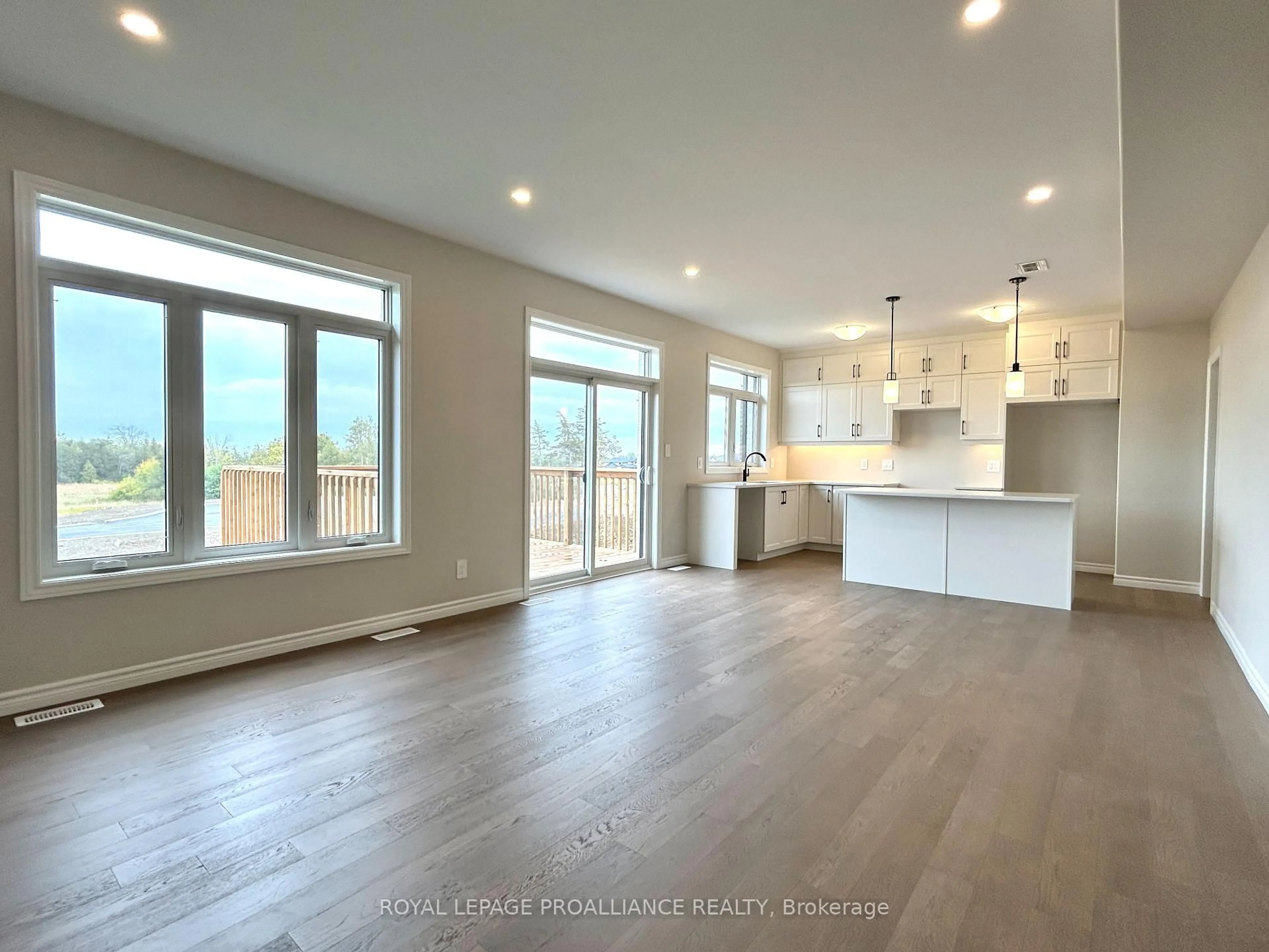 Open concept kitchen, wood/laminate floor for 16 Peace River St, Belleville Ontario K8N 0V6