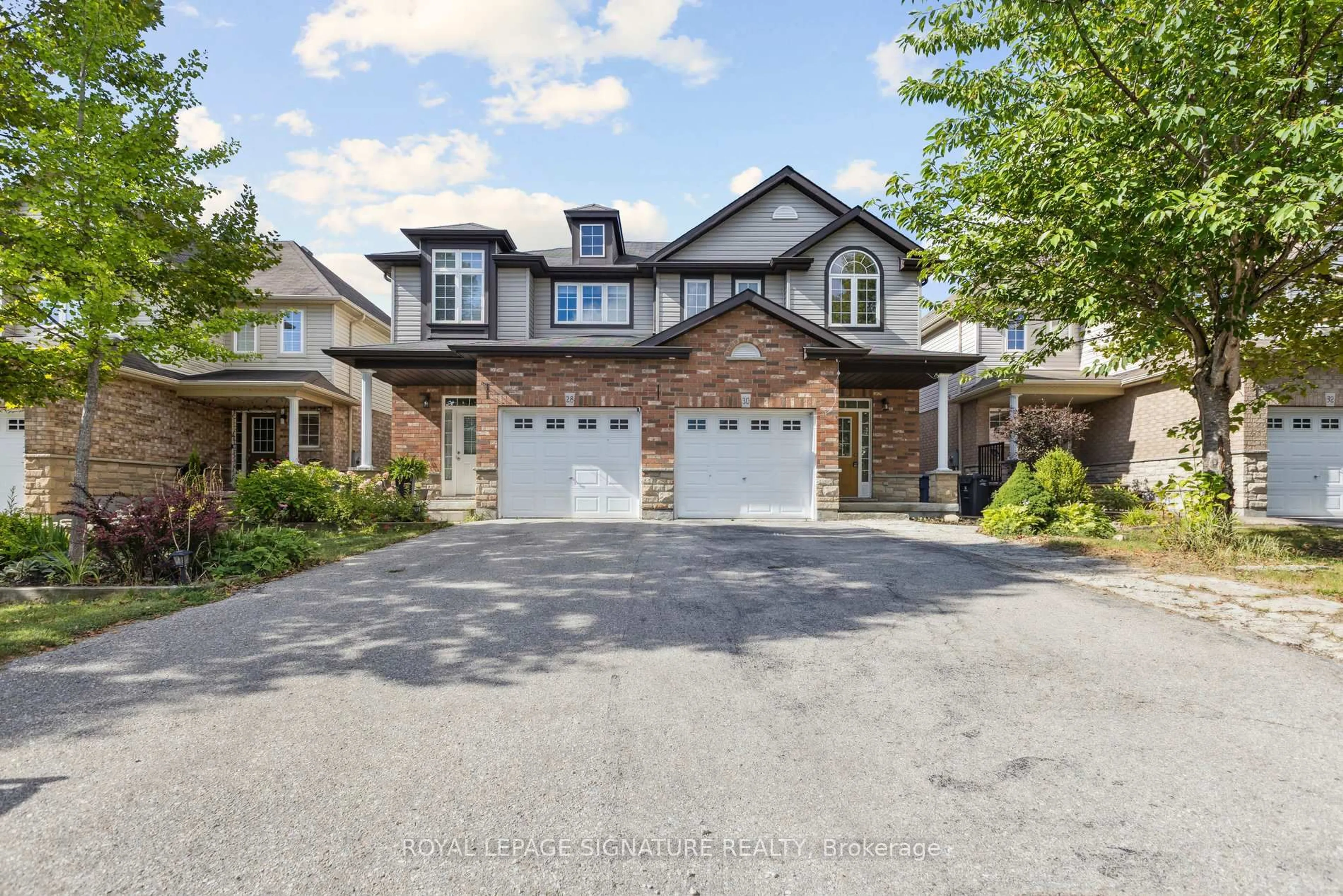 Home with brick exterior material, street for 30 Vipond St, Guelph Ontario N1E 0G9