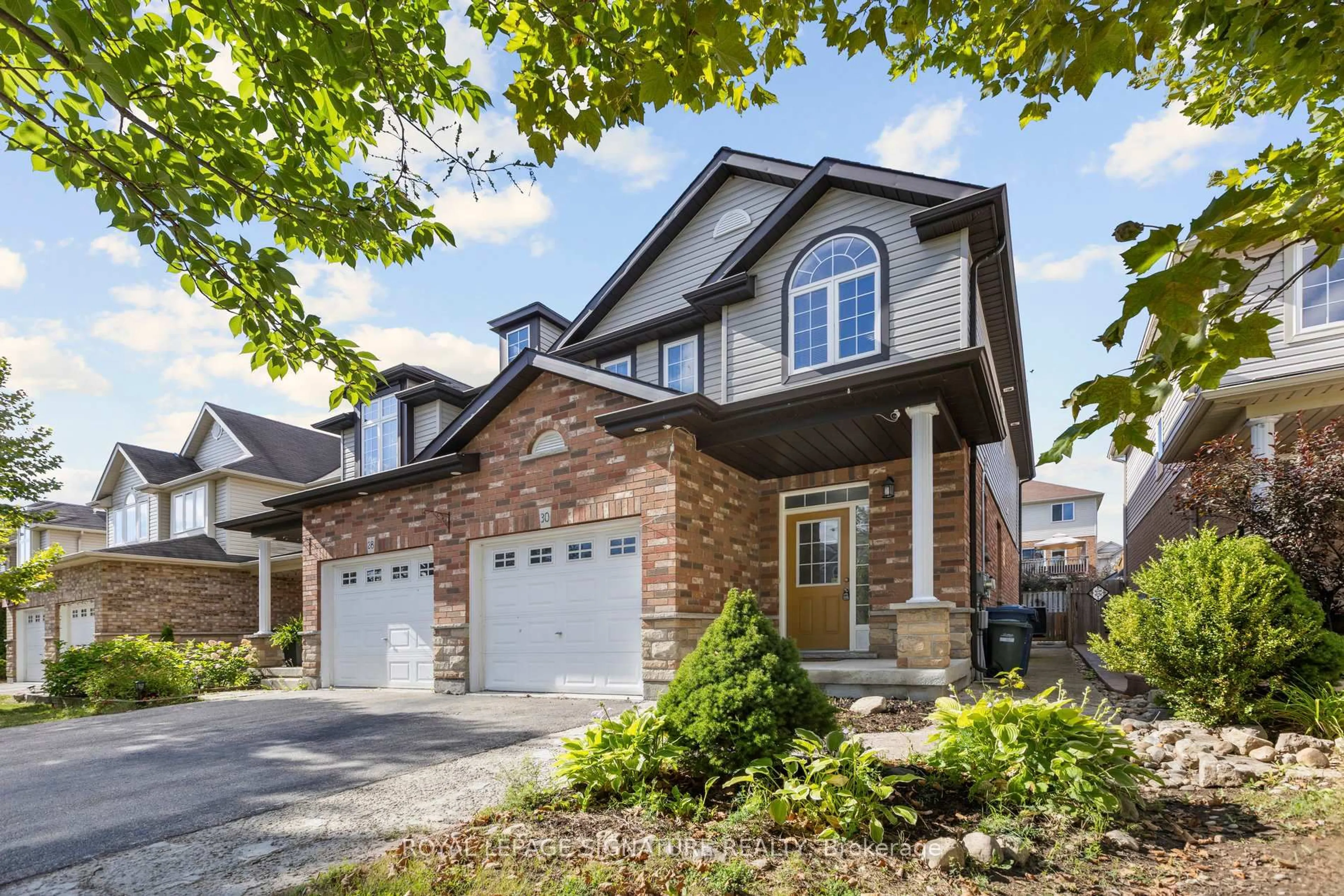 Home with brick exterior material, street for 30 Vipond St, Guelph Ontario N1E 0G9