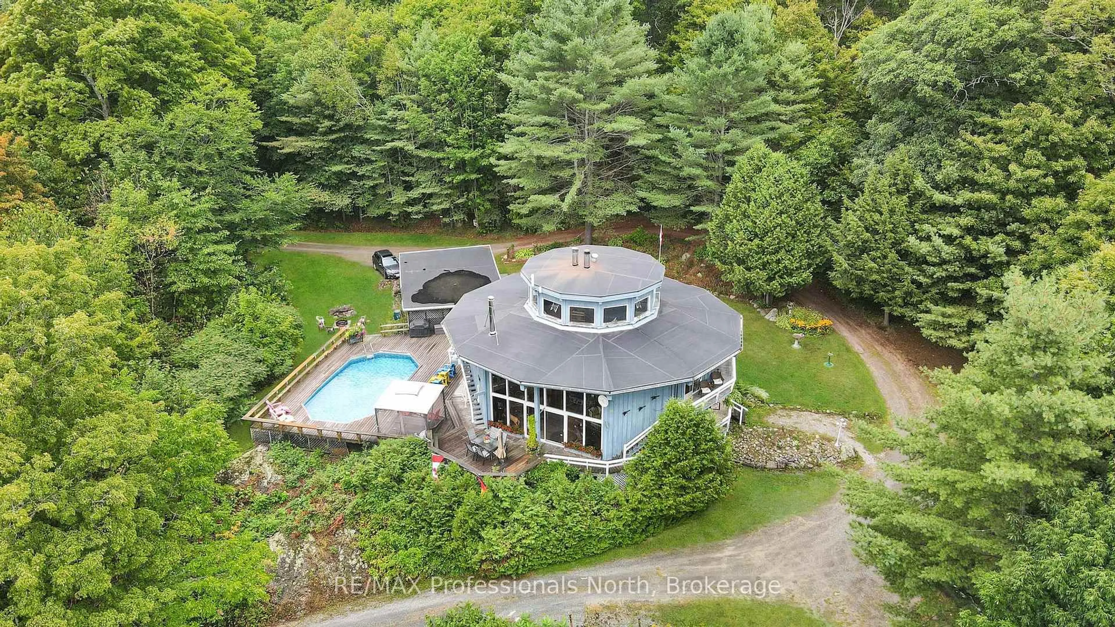 A pic from outside/outdoor area/front of a property/back of a property/a pic from drone, water/lake/river/ocean view for 17359 Highway 35, Algonquin Highlands Ontario K0M 1S0
