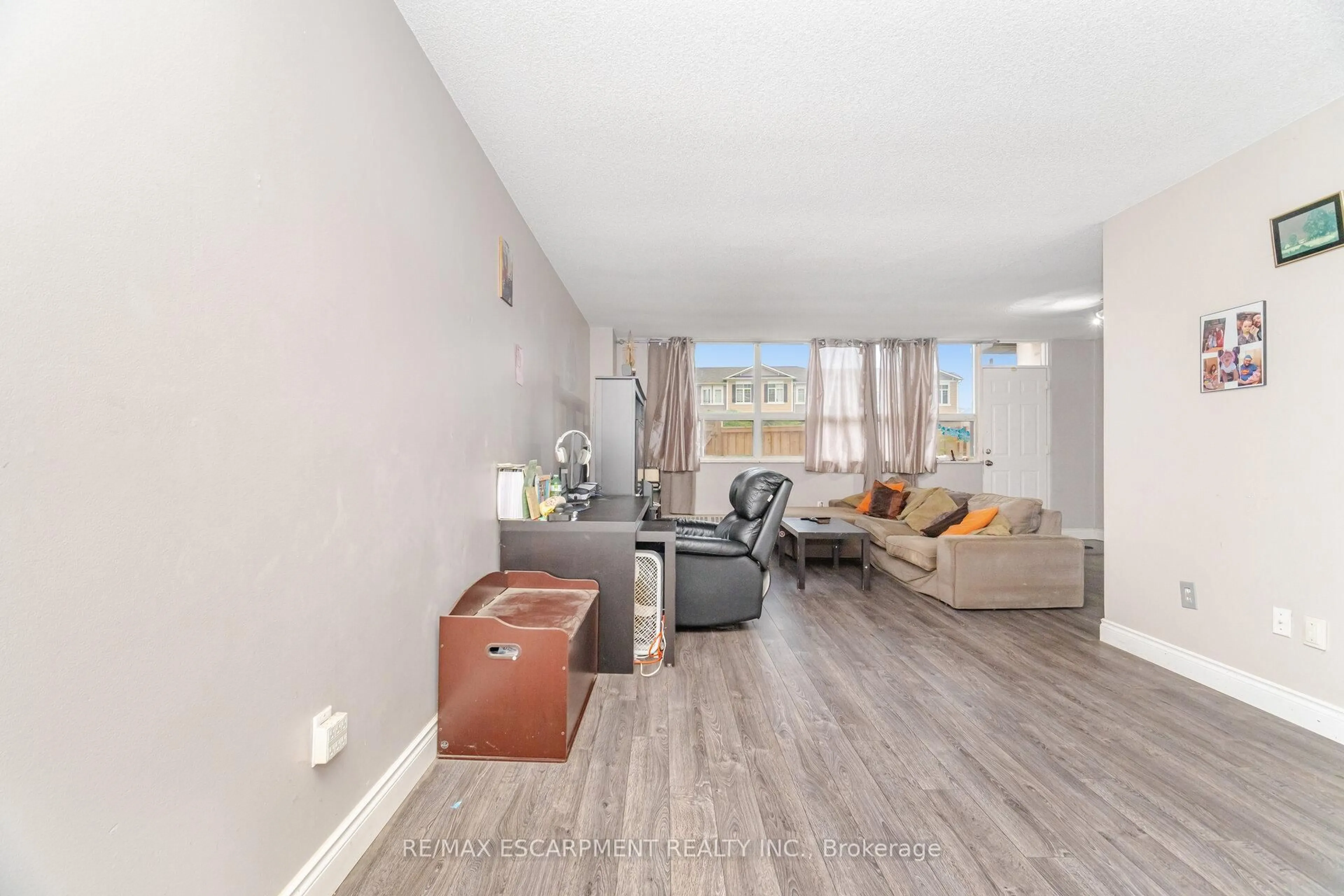 Living room with furniture, unknown for 15 Albright Rd #14, Hamilton Ontario L8K 5J2