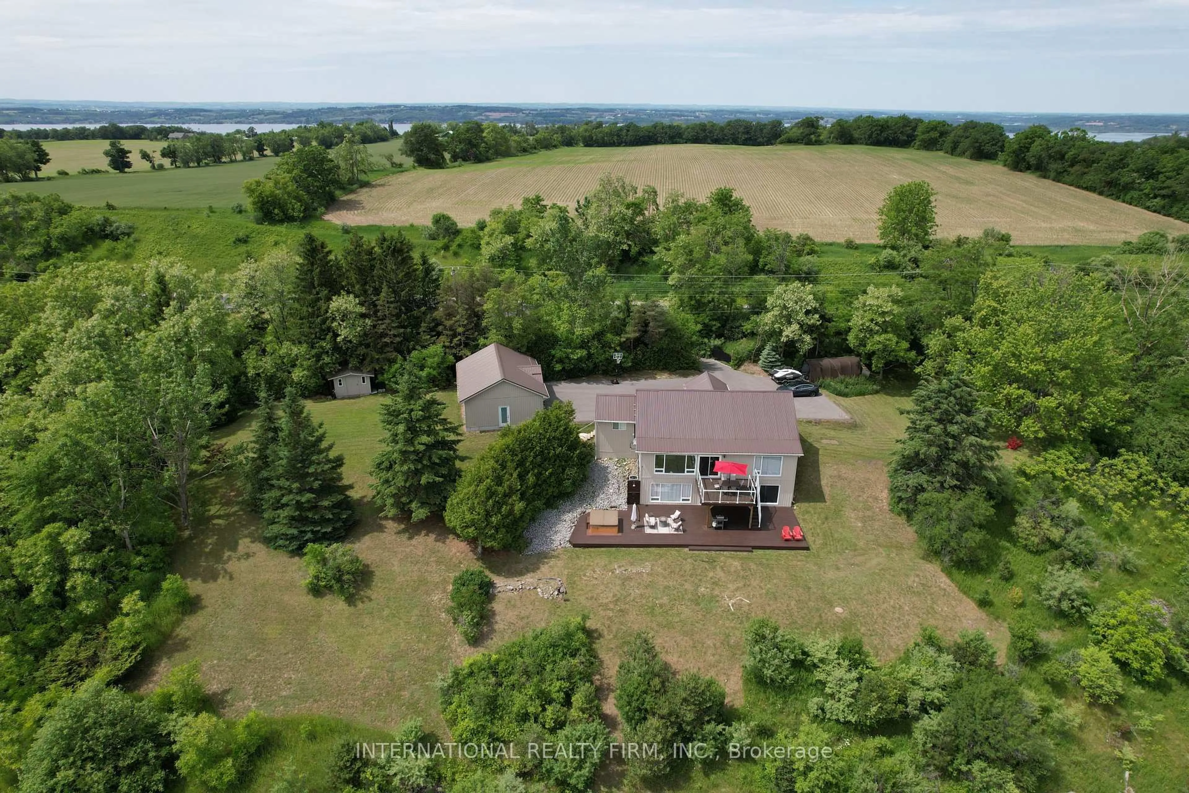 A pic from outside/outdoor area/front of a property/back of a property/a pic from drone, water/lake/river/ocean view for 8309 Oak Ridges Dr, Hamilton Township Ontario K0K 2E0
