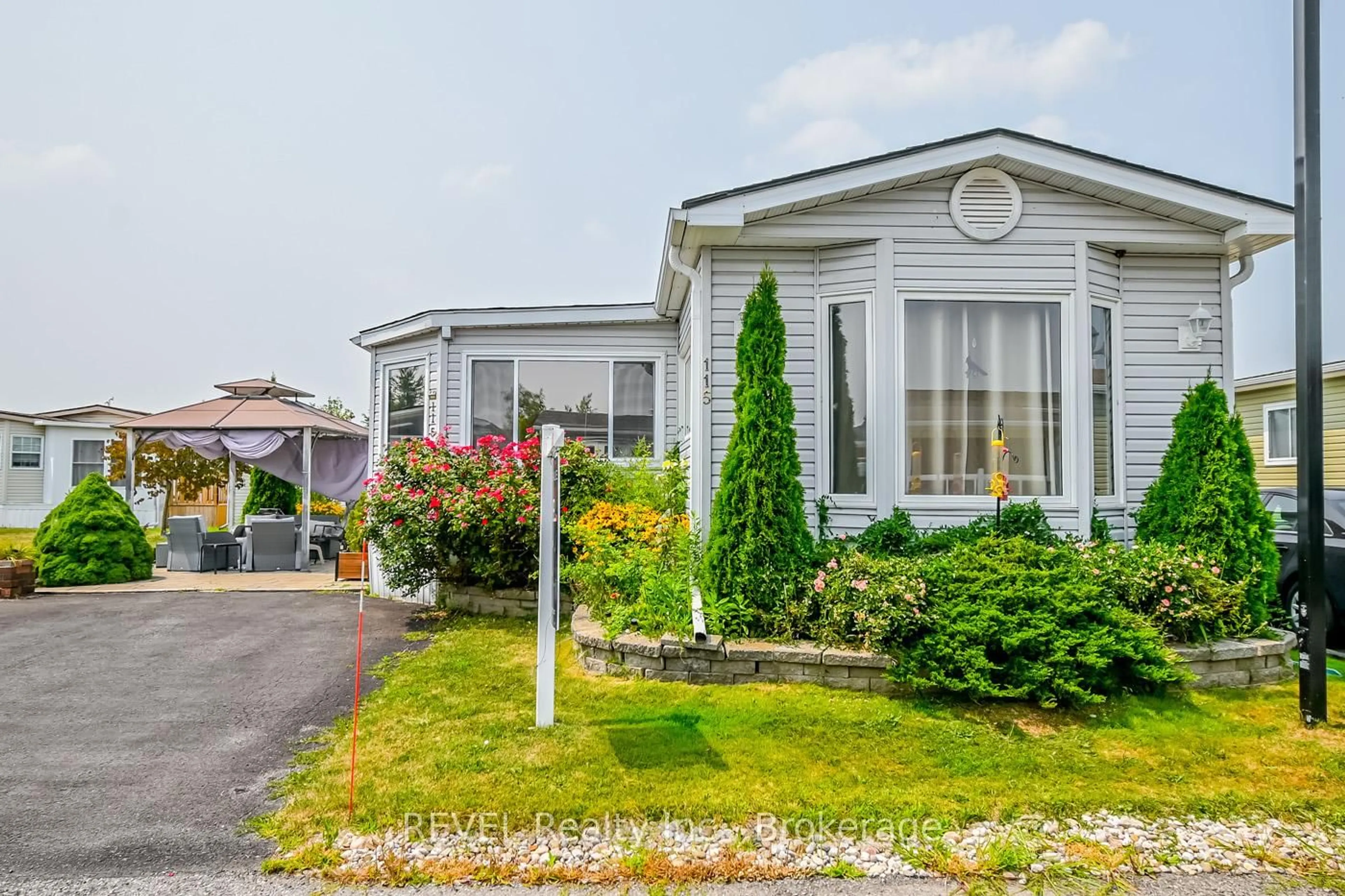 Home with vinyl exterior material, street for 3033 Townline Rd #115, Fort Erie Ontario L0S 1S1