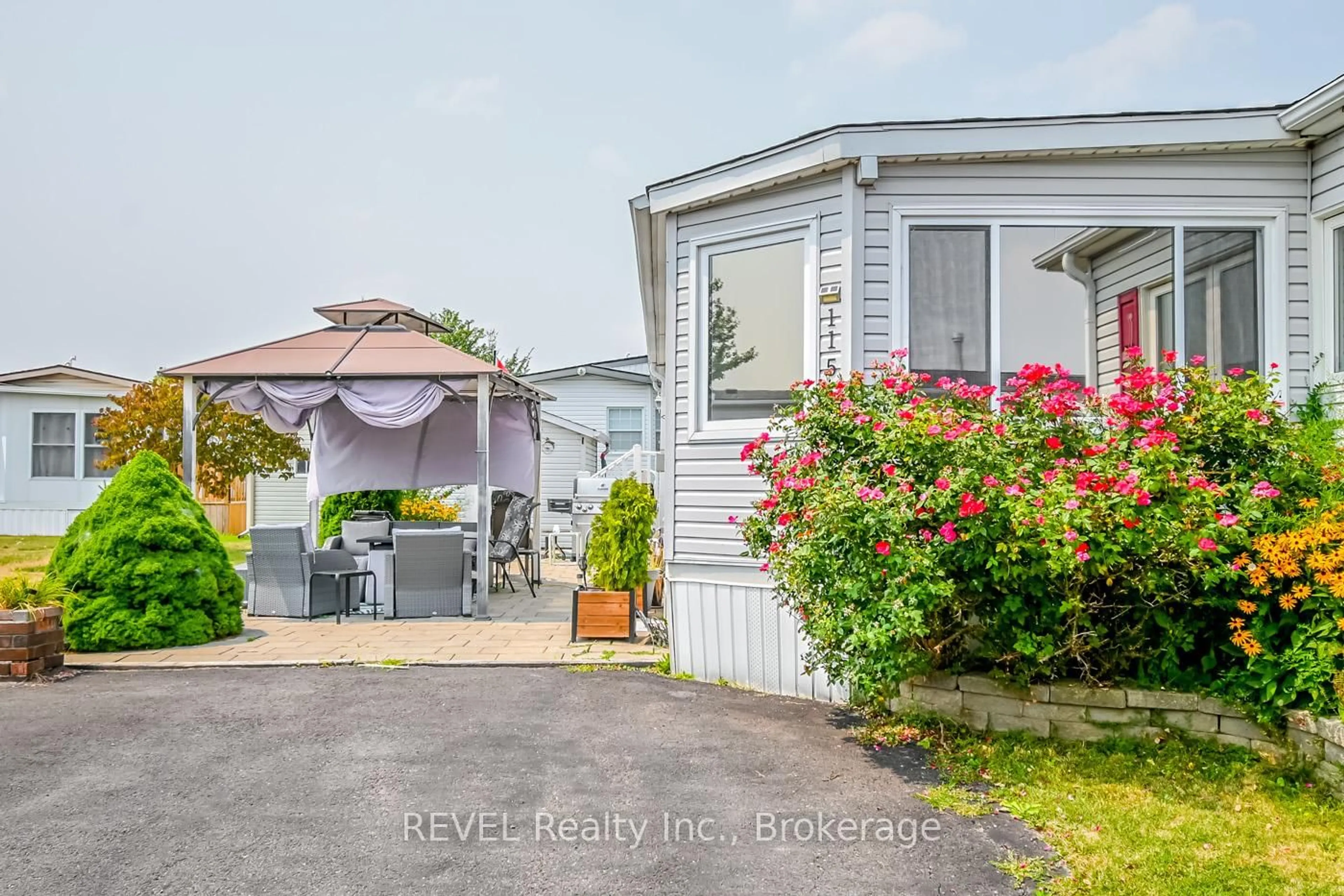 A pic from outside/outdoor area/front of a property/back of a property/a pic from drone, street for 3033 Townline Rd #115, Fort Erie Ontario L0S 1S1