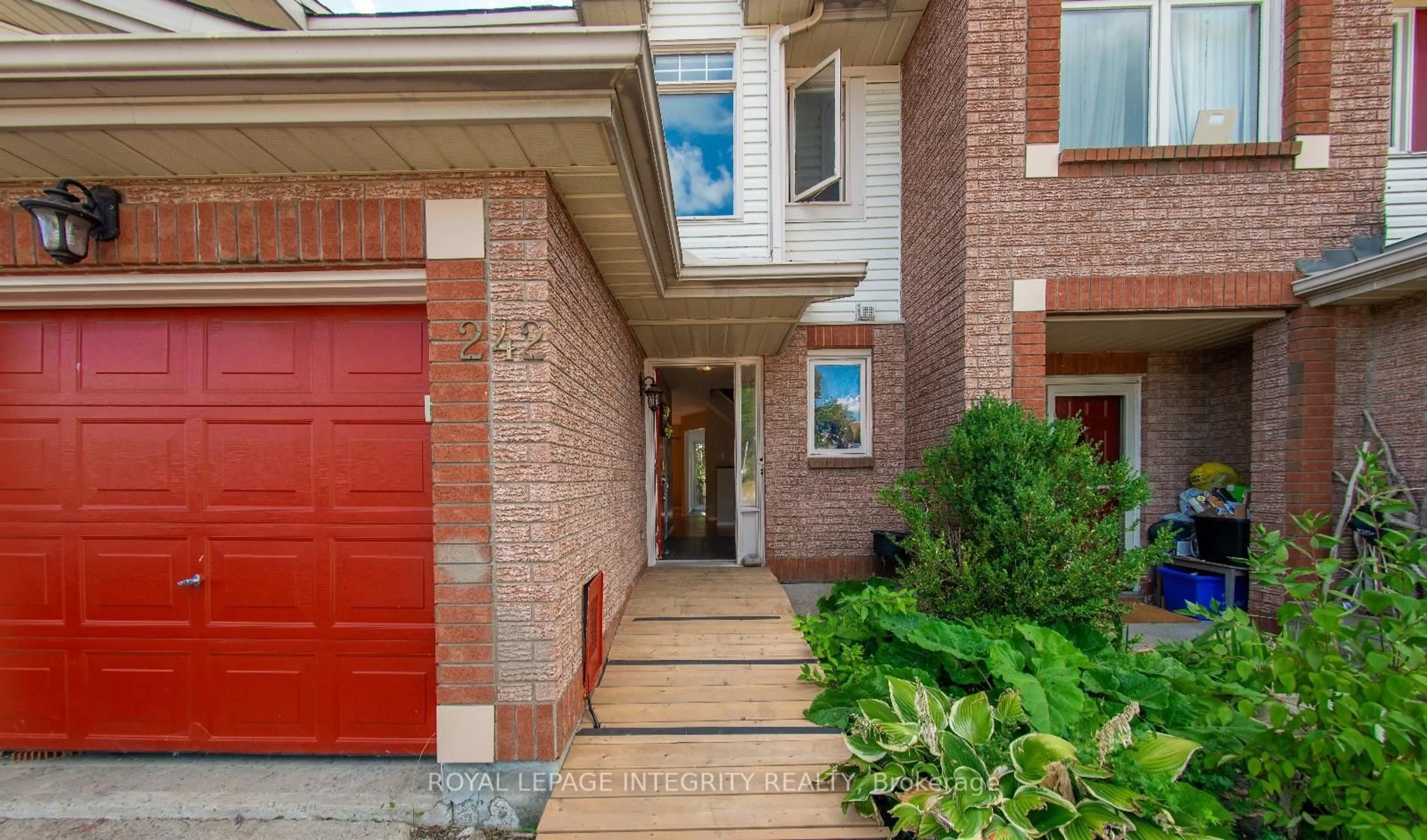 Home with brick exterior material, street for 242 Beatrice Dr, Ottawa Ontario K2J 4P1