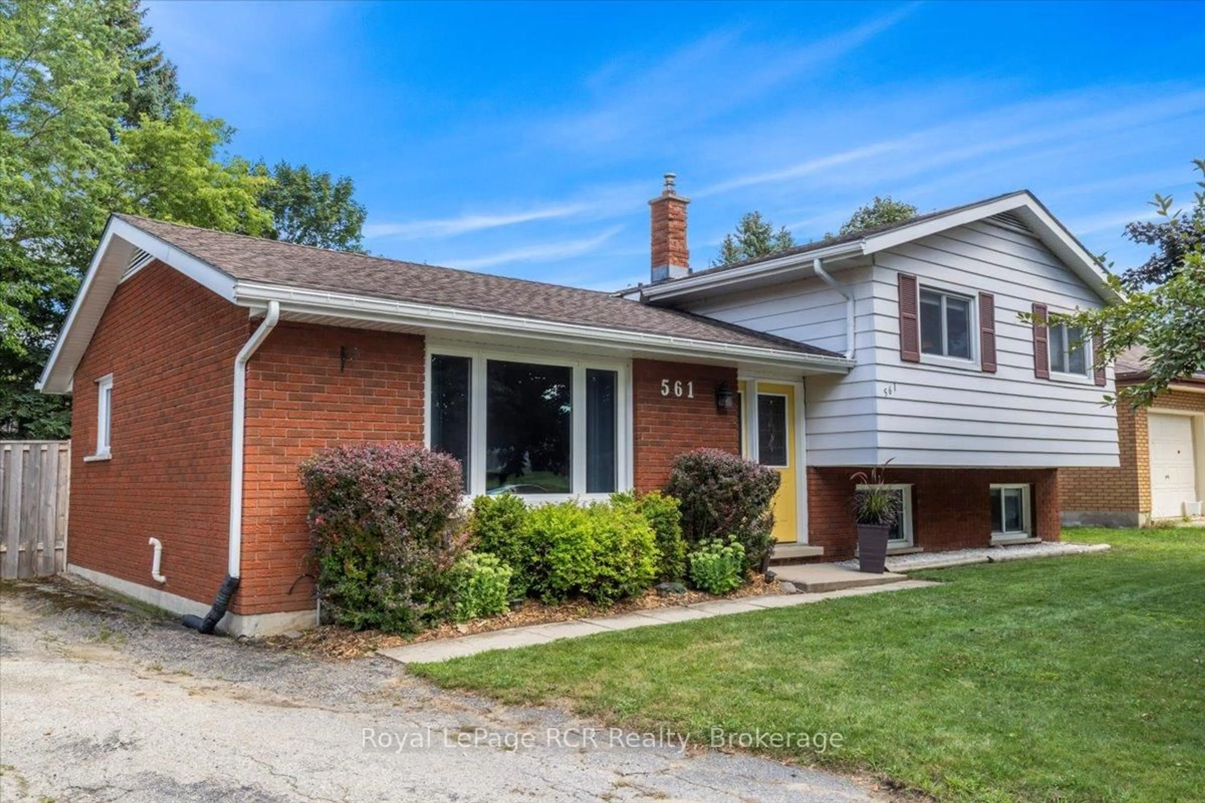 Home with brick exterior material, street for 561 18th Ave, Hanover Ontario N4N 3B2