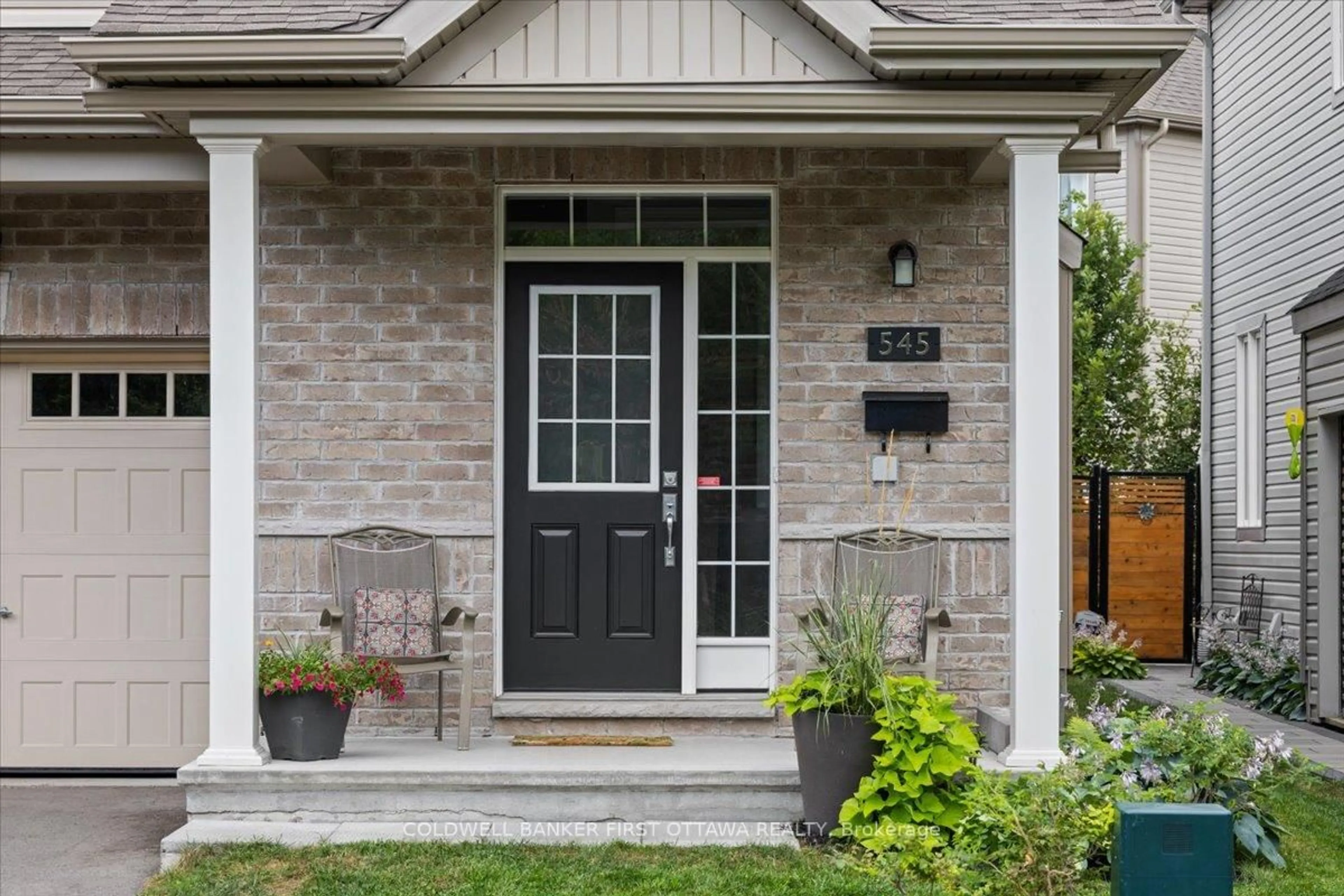 Home with brick exterior material, street for 545 Tulip Tree Way, Ottawa Ontario K1W 0L8