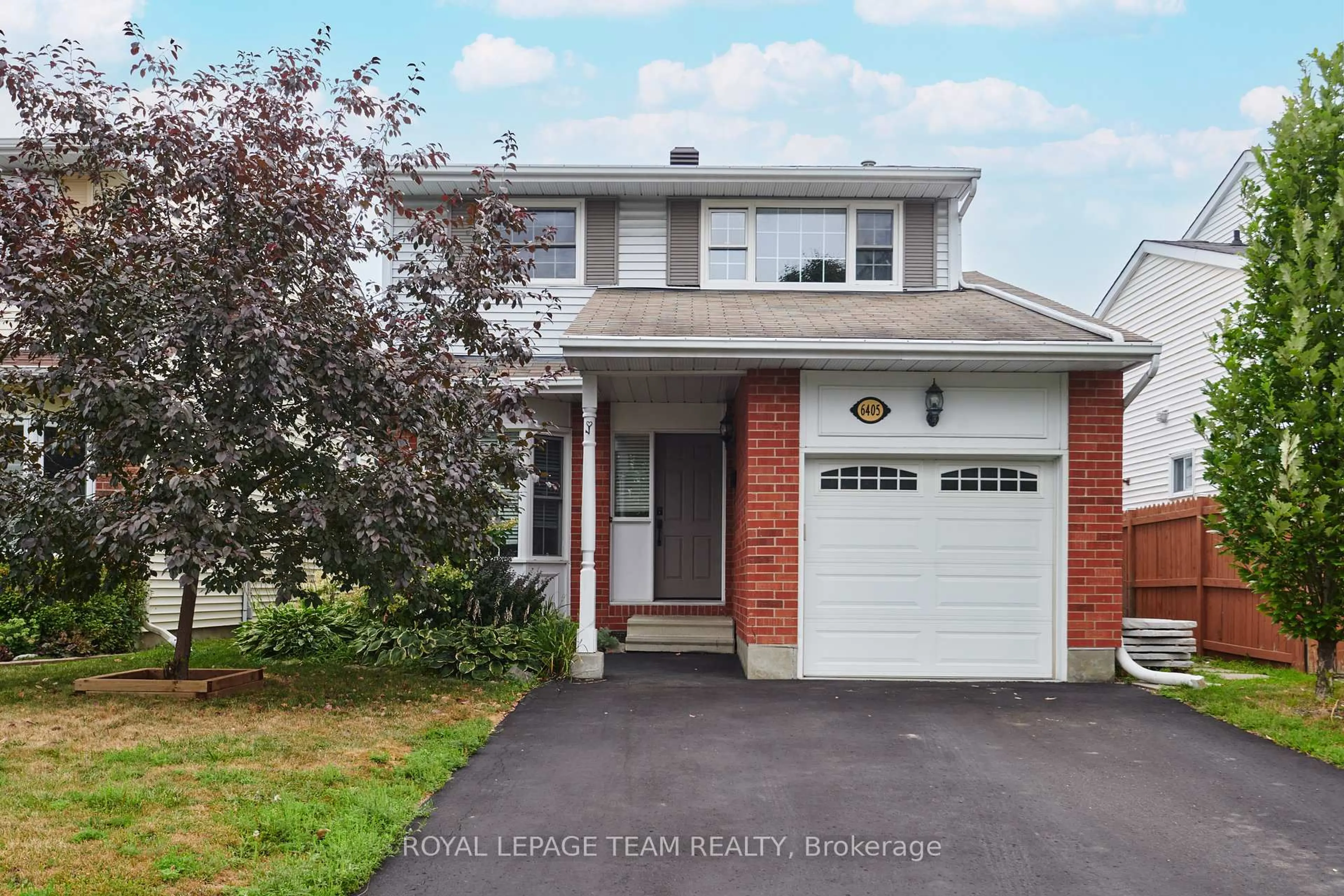 Home with vinyl exterior material, street for 6405 St Louis Dr, Ottawa Ontario K1C 2X9