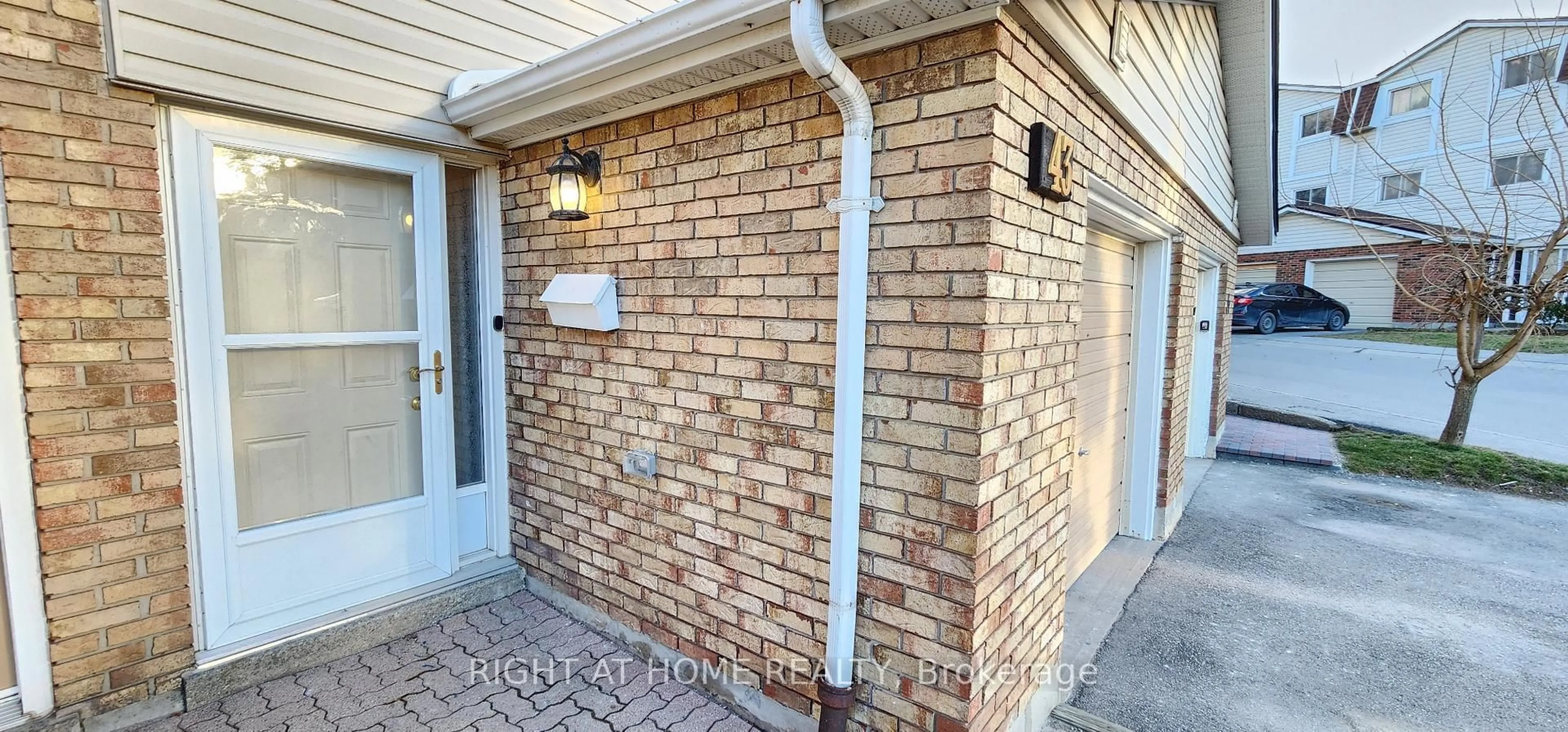 Home with brick exterior material, street for 11 Harrisford St #43, Hamilton Ontario L8K 6L7
