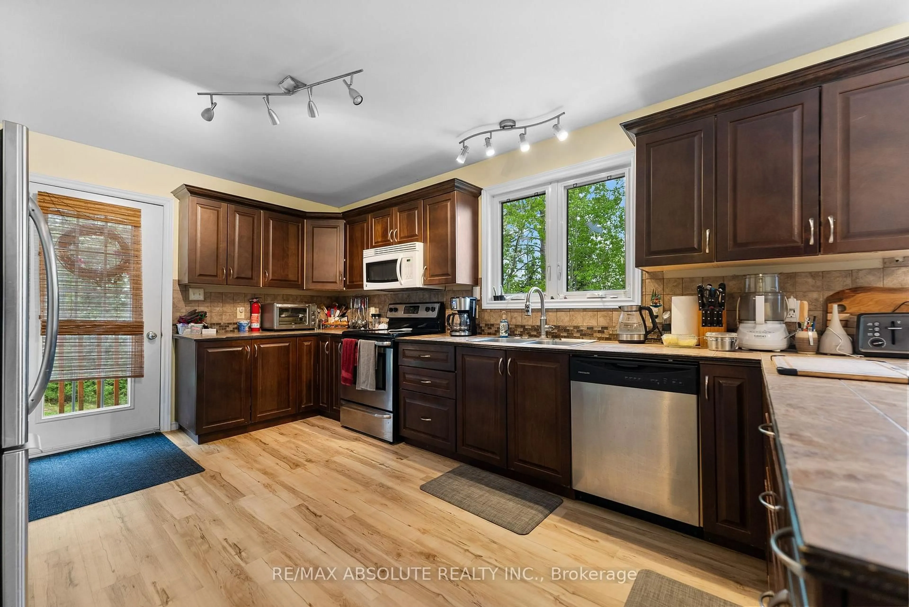 Open concept kitchen, wood/laminate floor for 4666 Matawatchan Rd, Griffith Ontario K0J 2R0