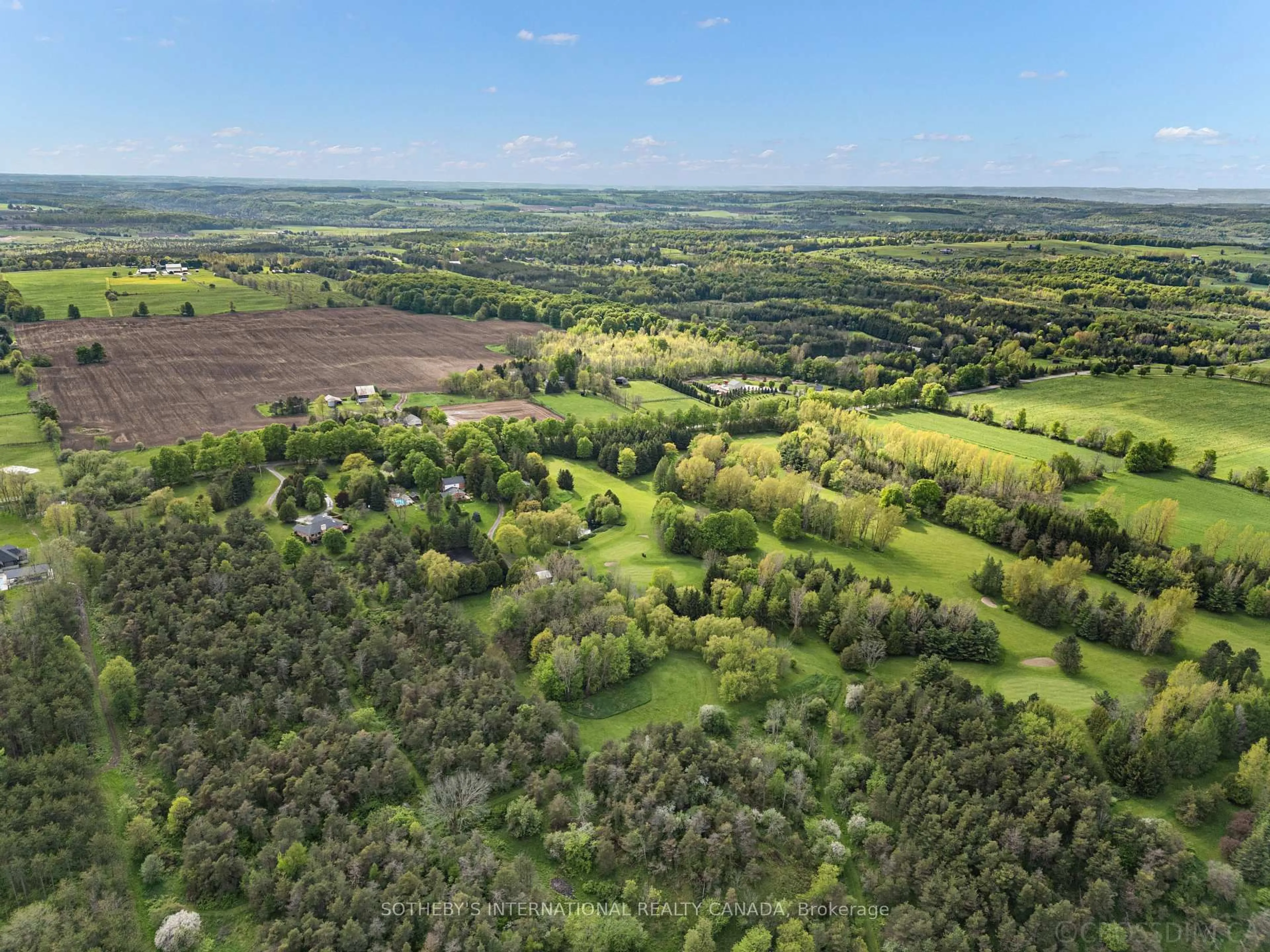 A pic from outside/outdoor area/front of a property/back of a property/a pic from drone, forest/trees view for 836081 4th Line, Mulmur Ontario L9V 0J1