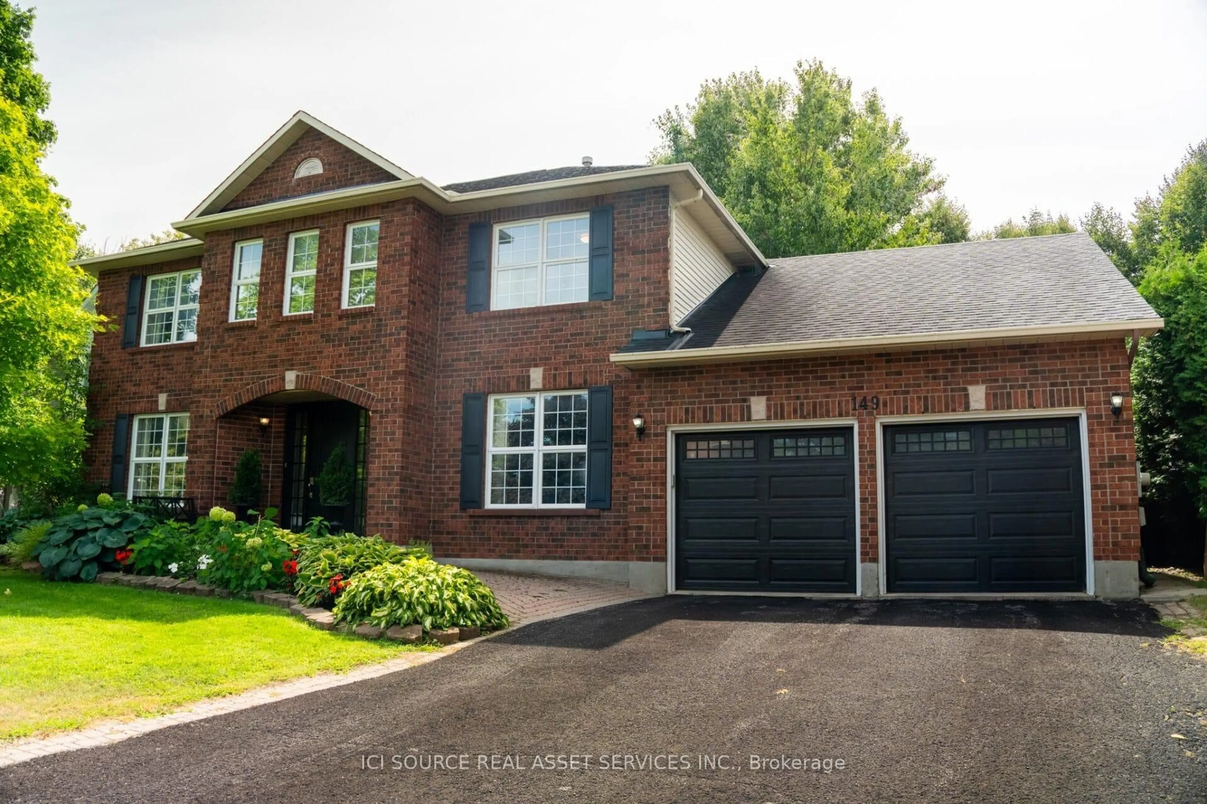 Home with brick exterior material, street for 149 Lanigan Cres, Stittsville Ontario K2S 1G9