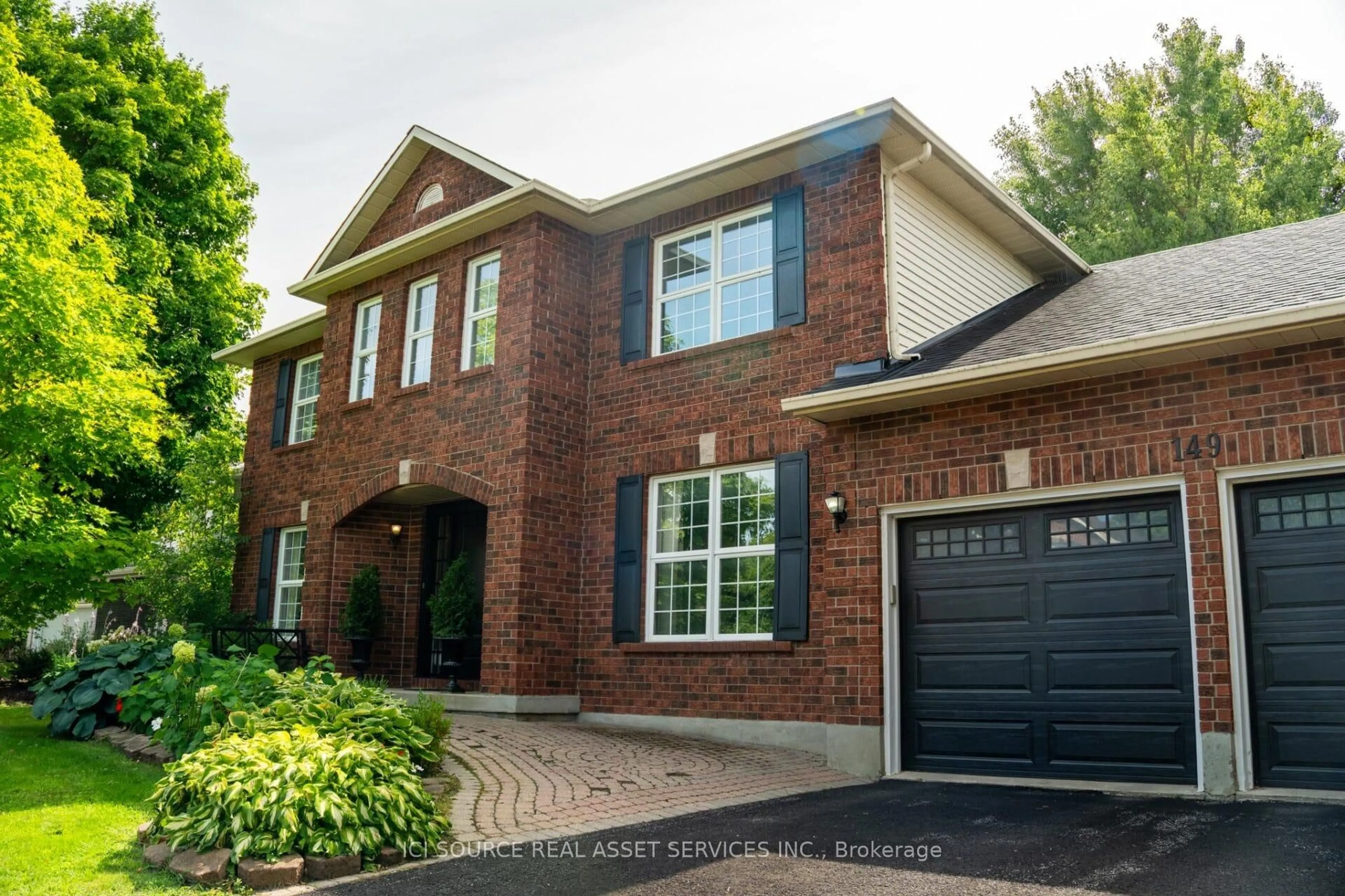 Home with brick exterior material, street for 149 Lanigan Cres, Stittsville Ontario K2S 1G9